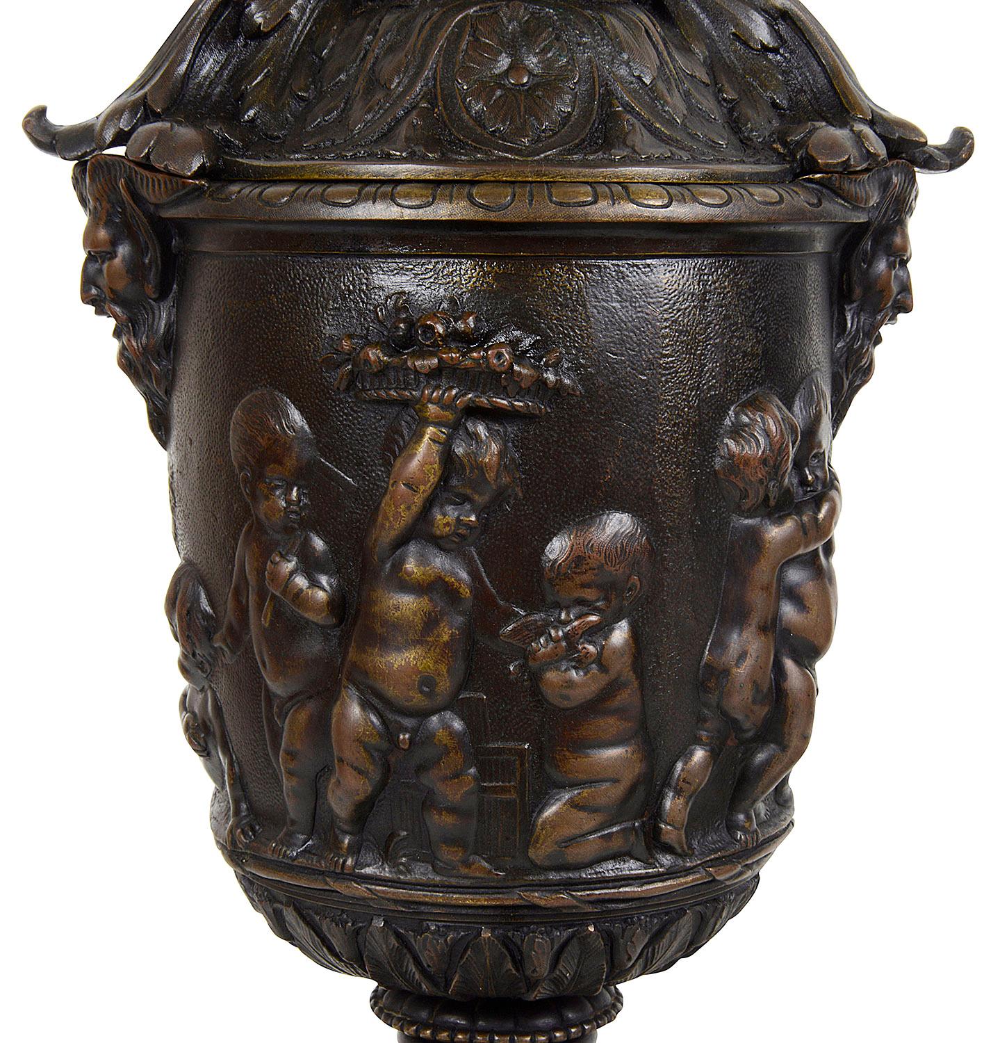 French Pair of Classical 19th Century Bacchus Lidded Bronze Urns For Sale