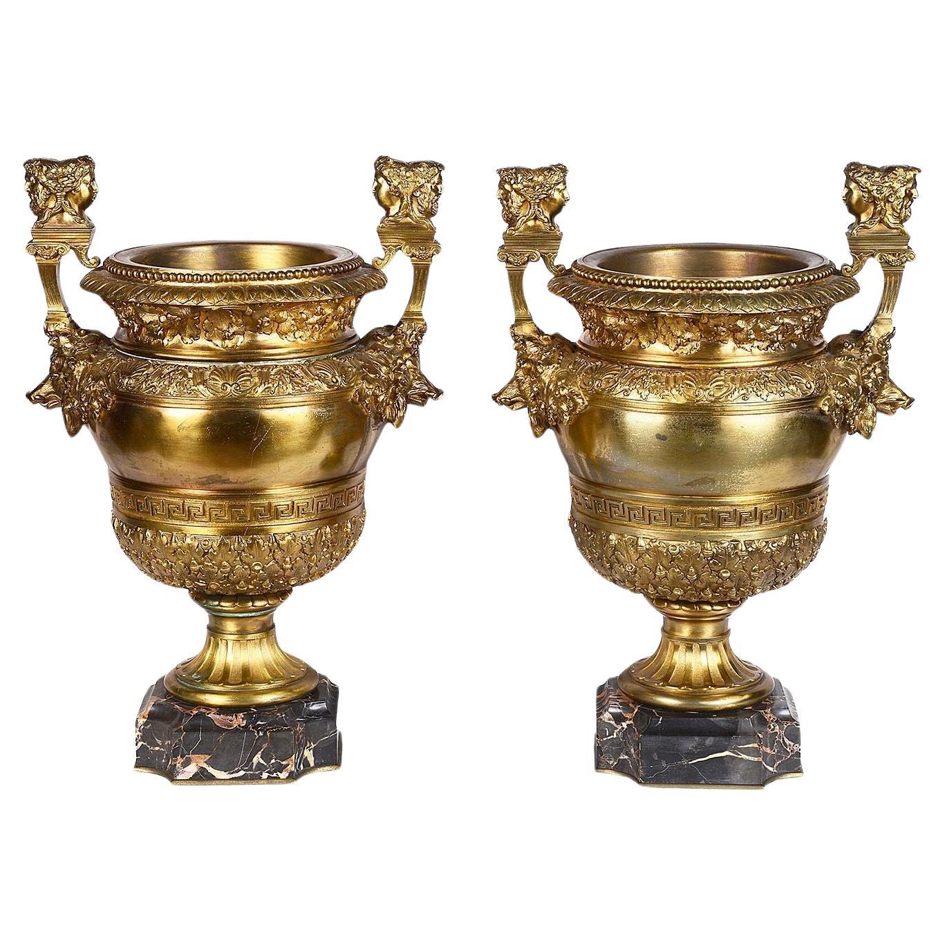 Pair classical 19th Century Ormolu urns. after Balling for Versailles For Sale