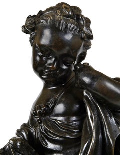 Pair classical bronze statues of children gathering grapes, 19th Century.