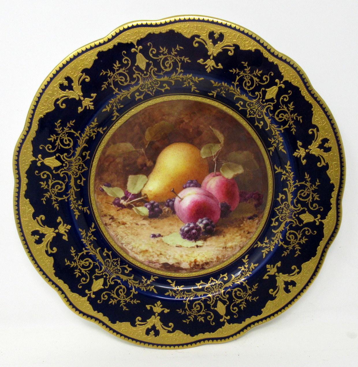 Stunning hand painted English porcelain Coalport pair of cabinet plates still life of fruits, decorated by Frederick Chivers, of outstanding quality and large size, circa 1910-1920.

Painted with a still Life of fruits depicting a large pear,