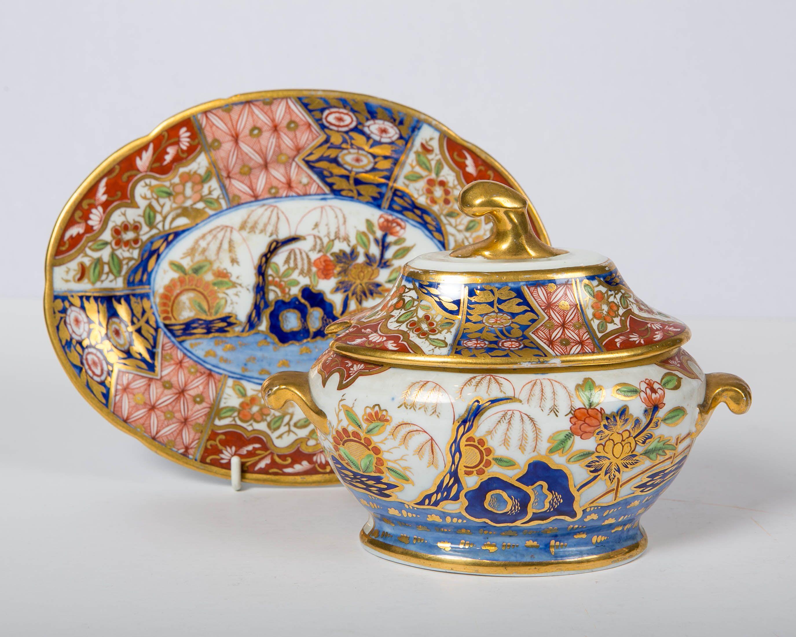 Why we love it: The color combinations are magnificent.
We are proud to offer this pair of Coalport Rock and Tree pattern sauce tureens. They were hand painted in England, circa 1820. The pattern shows a fenced garden, peonies and a willow tree