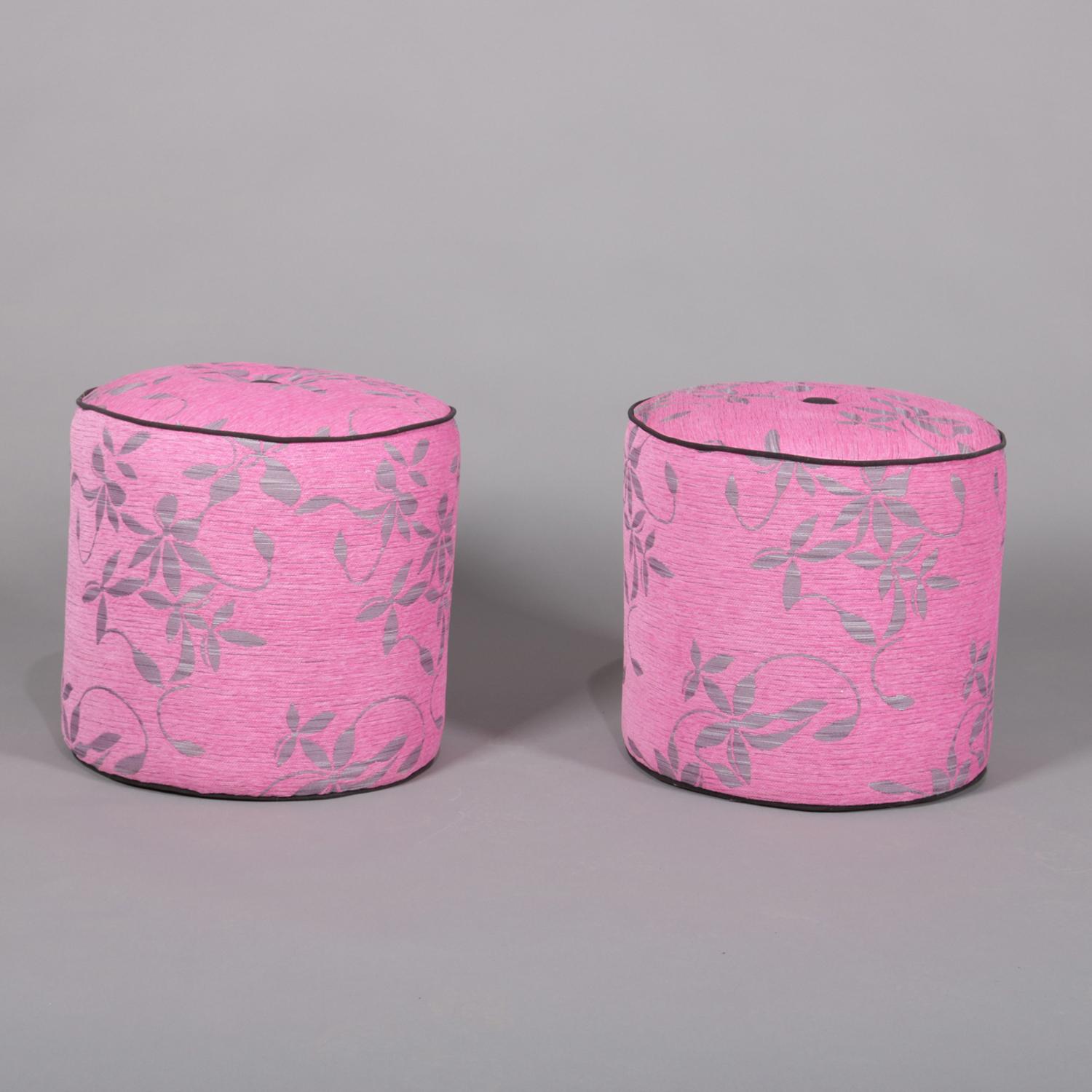 Pair of contemporary Aesthetic movement style ottoman poufs feature fuschia pink upholstery with silver foliate decoration, black piping and center button, 20th century.

***DELIVERY NOTICE – Due to COVID-19 we are employing NO-CONTACT PRACTICES in