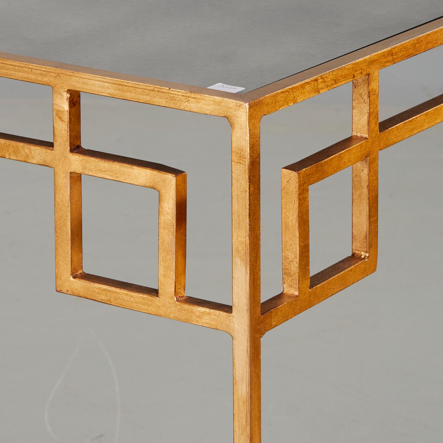 21st c., Two pairs of custom nesting tables in a Greek Key design with smoky inset mirrored glass tops, unmarked. These are very smart looking and highly functional tables. They would work beautifully as end tables. The smokey mirrored glass top
