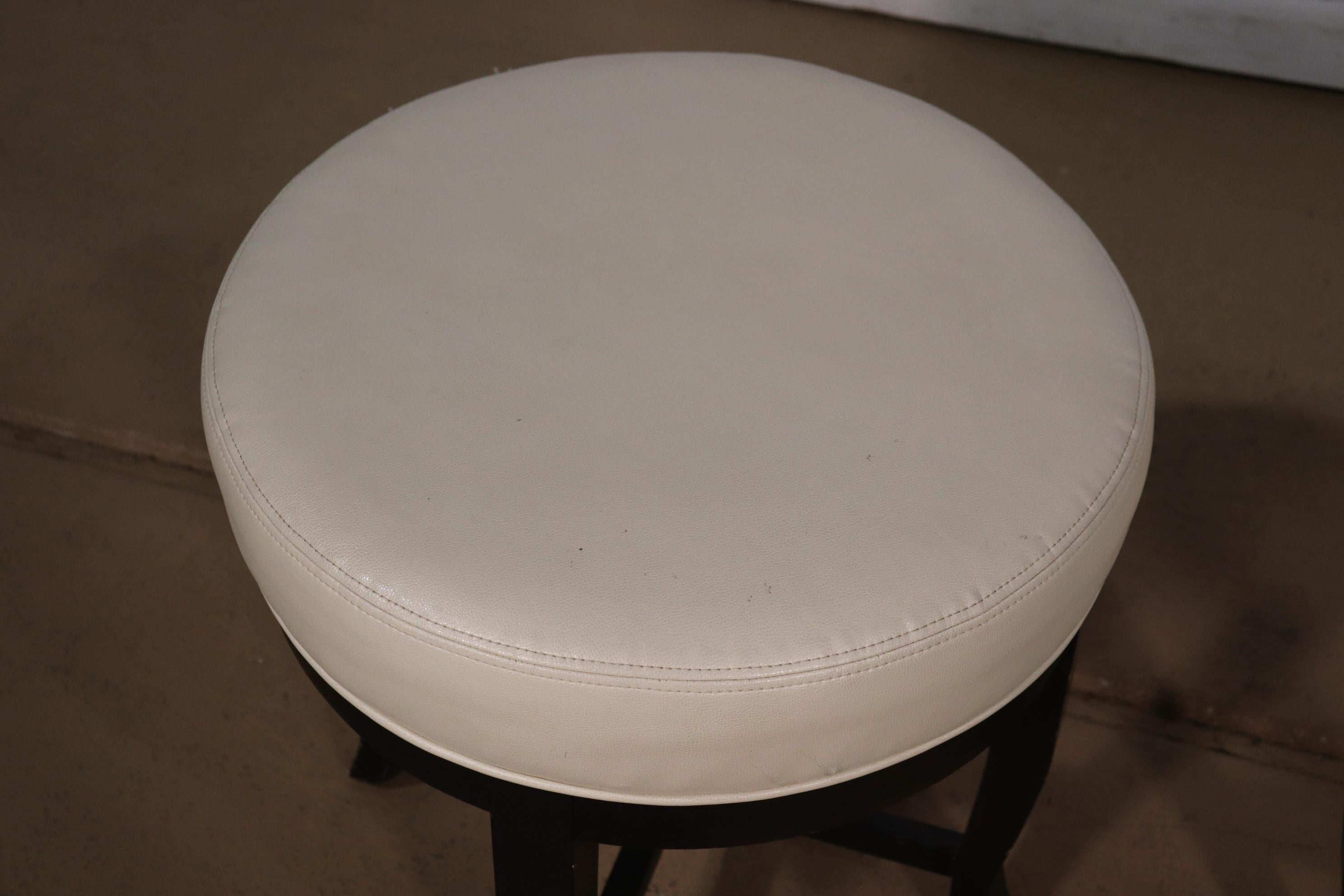 Pair Contemporary White Leather and Ebonized Round Stools 1