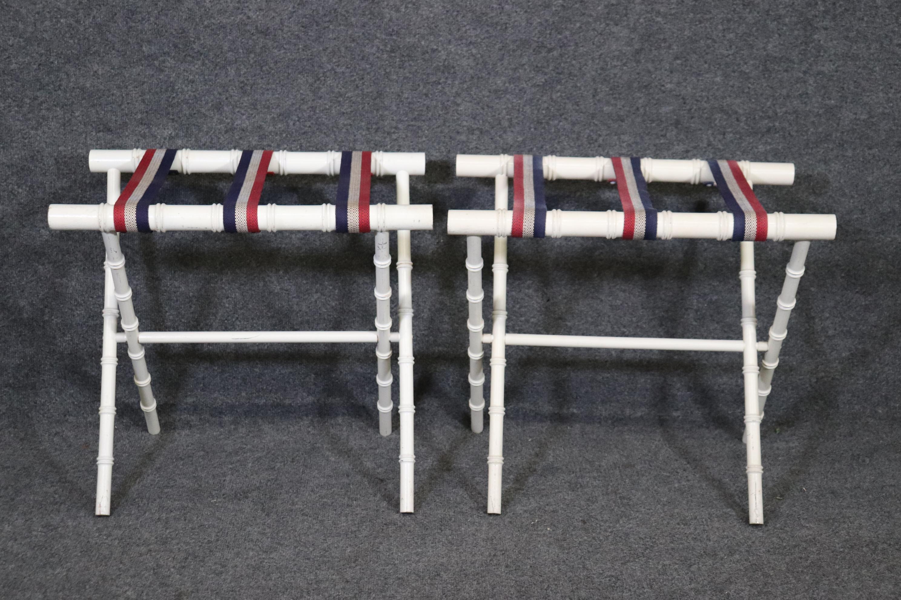 Dimensions- H: 20 1/2in W: 22in D: 20 1/2in 
This Pair of Creme Paint Decorated Faux Bamboo Luggage Racks In The Manner of Jacques Adnet are truly a unique and made with quality in mind. This pair is made of wood and was done in a creme finish. The