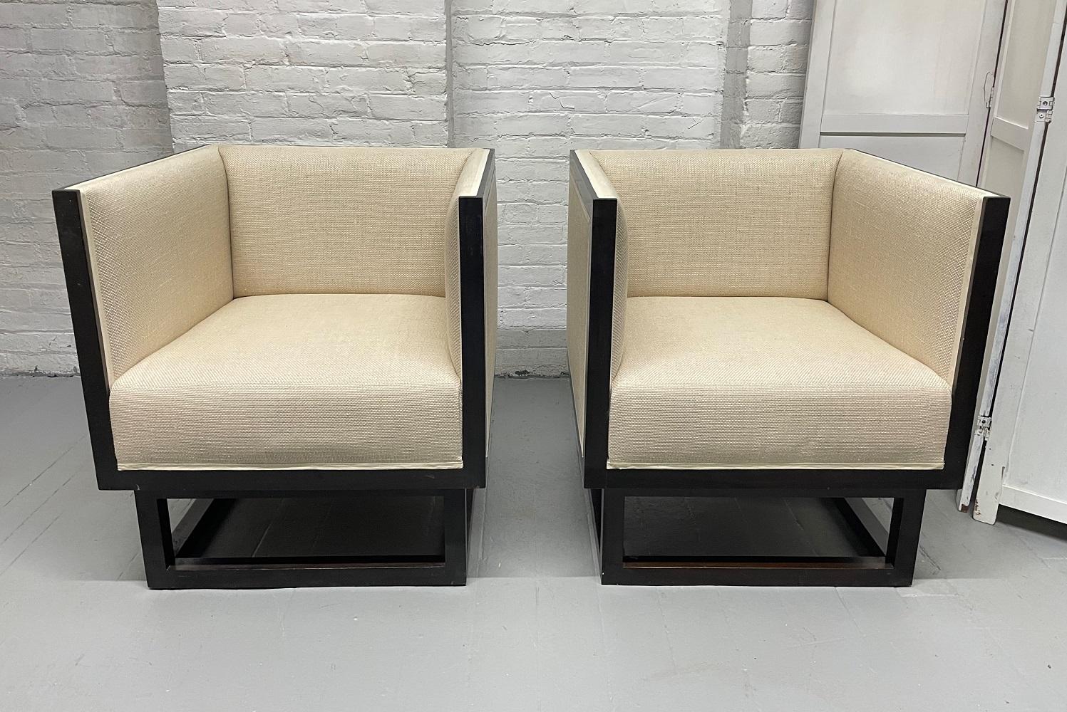 Chairs are upholstered in linen and the frame has a dark mahogany finish. Josef Hoffmann for Wittmann.