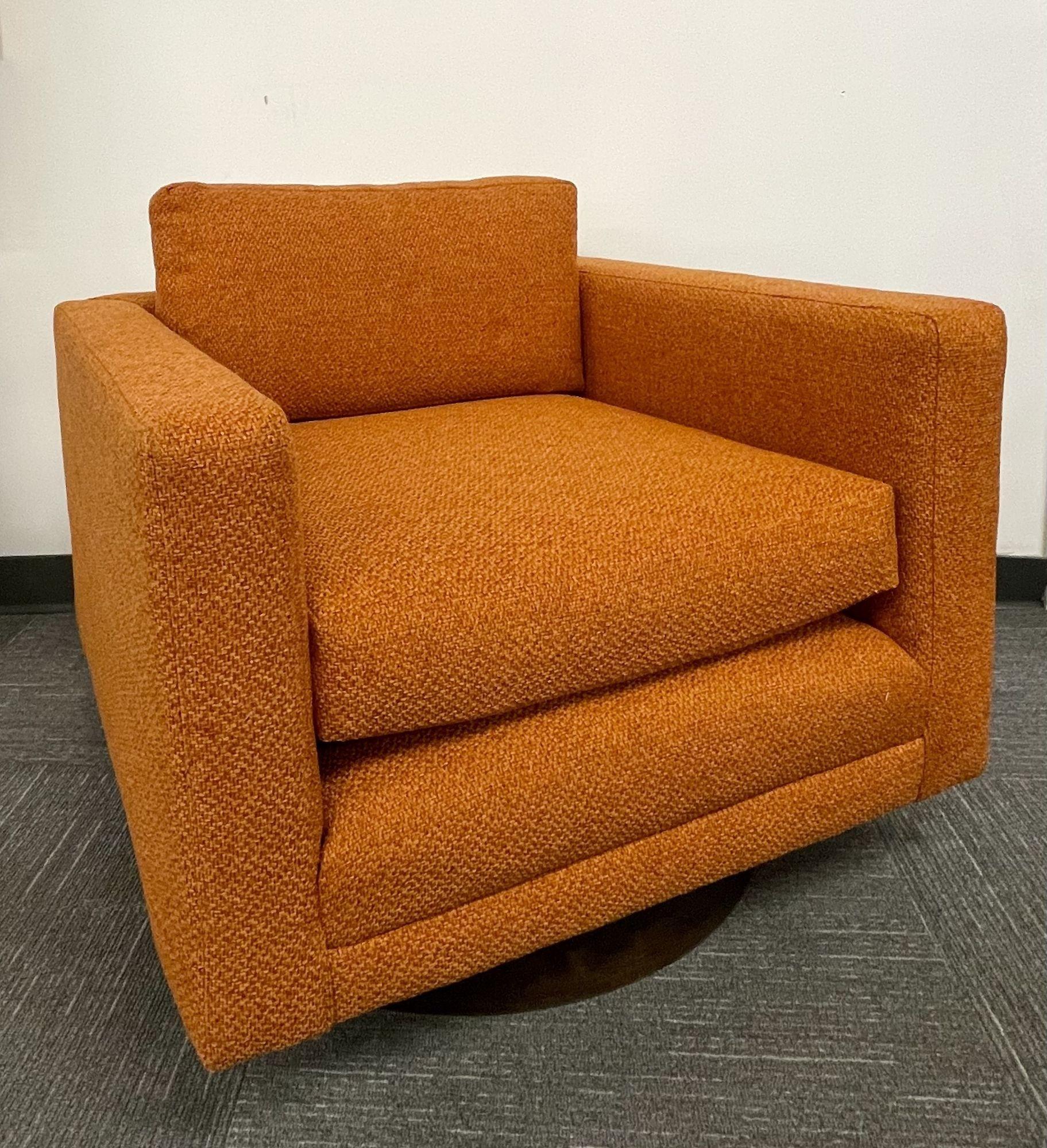 Pair Cube Mid-Century Modern swivel chairs, Milo Baughmant Style
 
A fine pair of 1970s Baughman Style Swivel Base Lounge or Cube chairs. Having the iconic style of the Mid Century Modern era these lovely early chairs do not have any markings