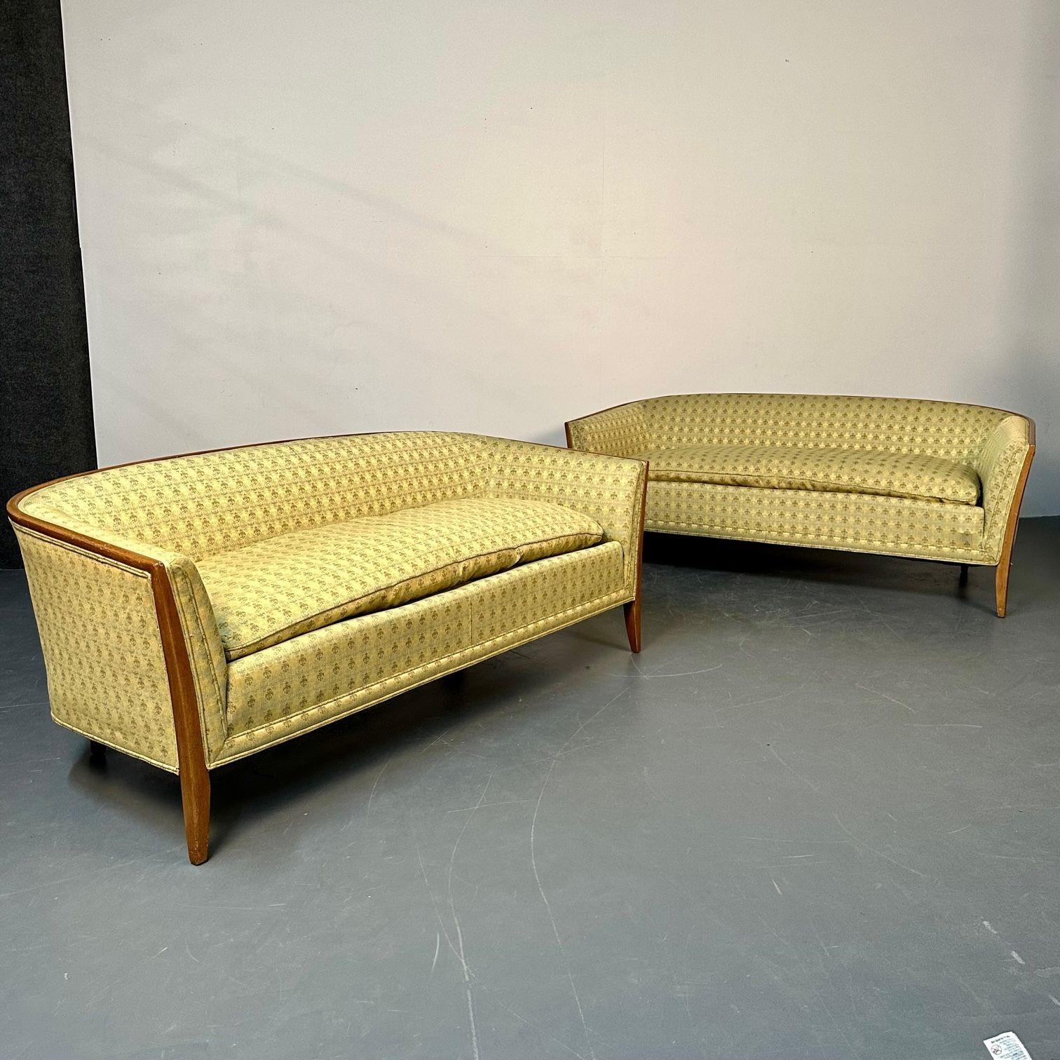 Pair Curved Mid-Century Modern Sofas / Settees Labeled John Stuart, Walnut

Irwin Furniture Company settees or loveseats designed by John Stuart. Both bearing labels. The pair having lovely sleek frames covered in a clean modern textile. A fine