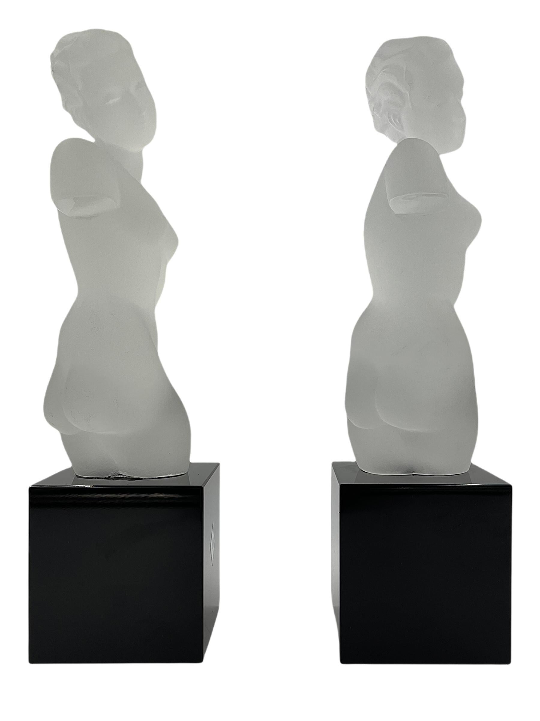 Spectacular and stunning female glass torsos with a clear frosted finish. in full relief and mounted on a cut and polished square black amethyst glass base. Designed by Eleon von Rommel / Berlin in 1935 for the 