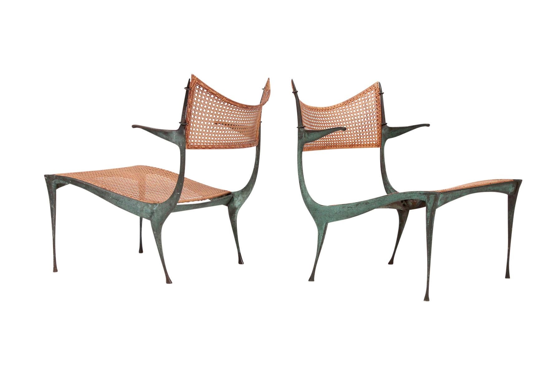 Rare pair of Dan Johnson Gazelle lounge chairs in beautifully patinated bronze and cane. Very rare matched pair in very good condition.