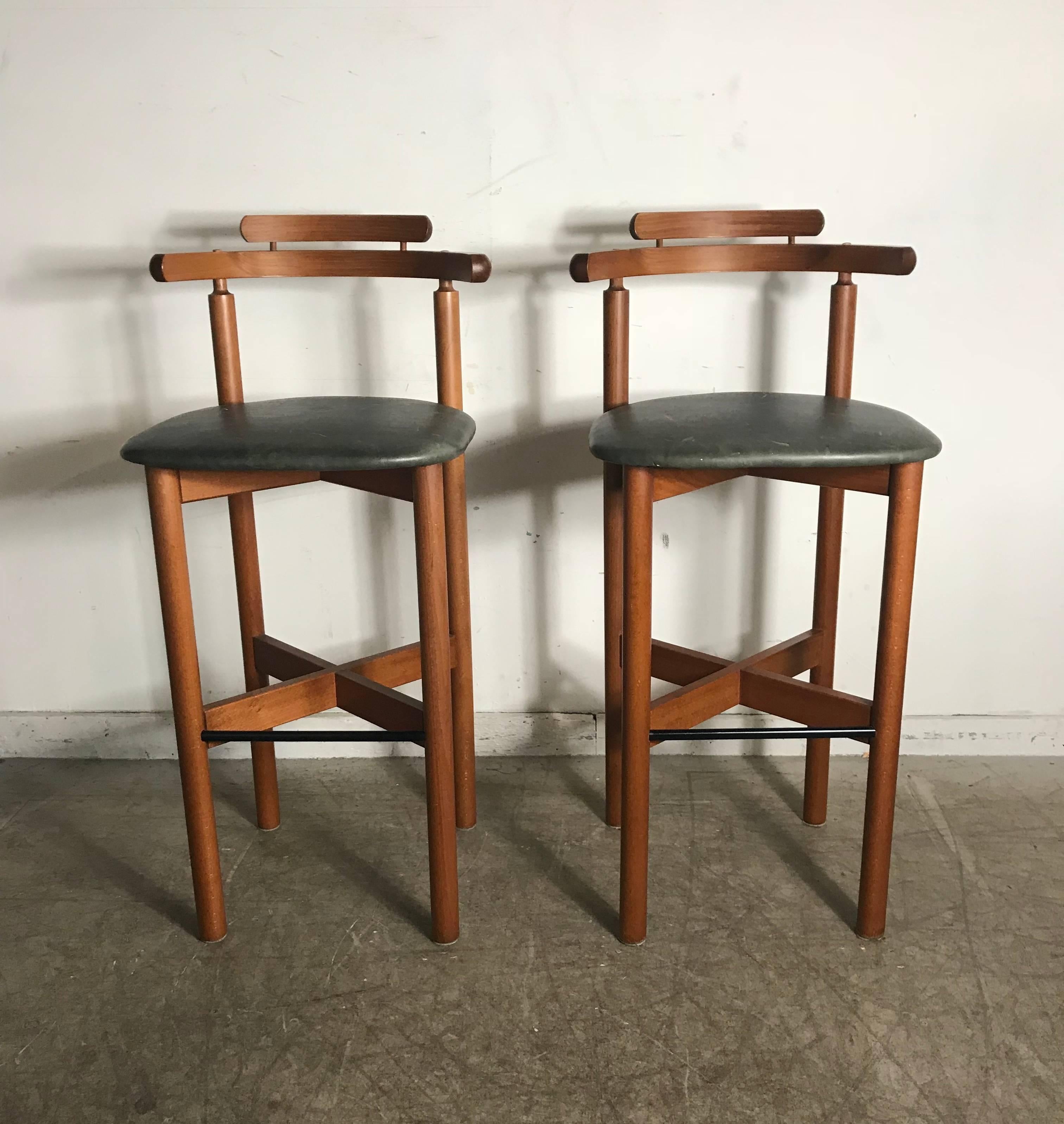 Pair of Danish bar or counter stools, teak and leather by Gangso Mobler, superior quality and construction Classic Scandinavian design and styling.