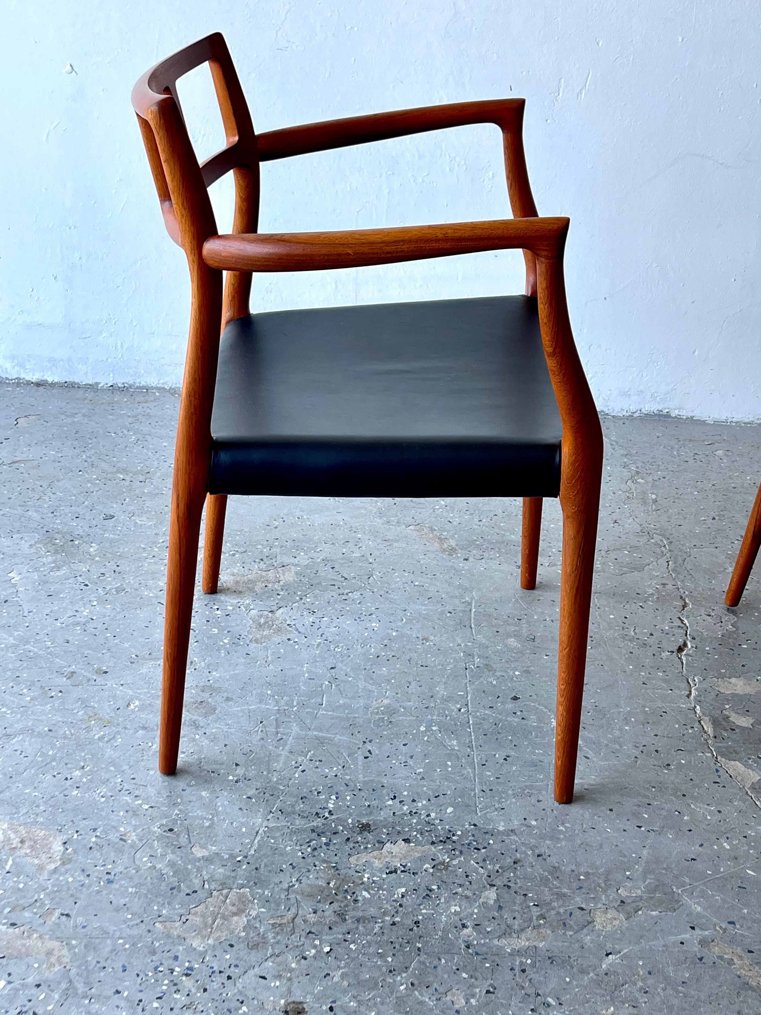 Mid-20th Century Pair Danish Mid Century Modern Model 64 Teak Armchairs By Niels Otto Møller