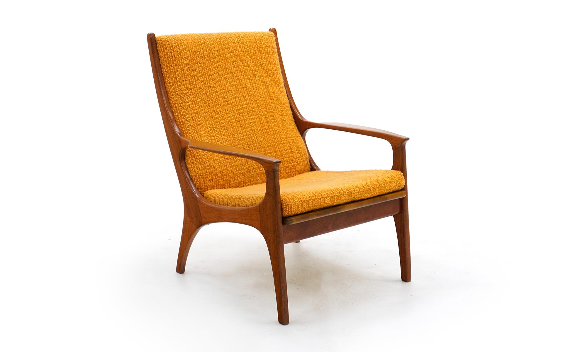 Complimentary pair of teak Danish lounge chairs. One rocking chair and one stationary. Both are very comfortable. Completely original and in very good condition. Extremely well made these are a great buy!

Armchair Dimensions
34.25 in H x 26 in D