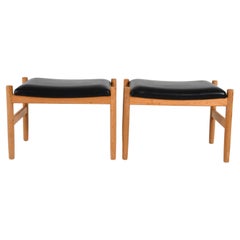 Pair Danish Modern Oak and Black Leather stools by Hugo Frandsen for Spottrup