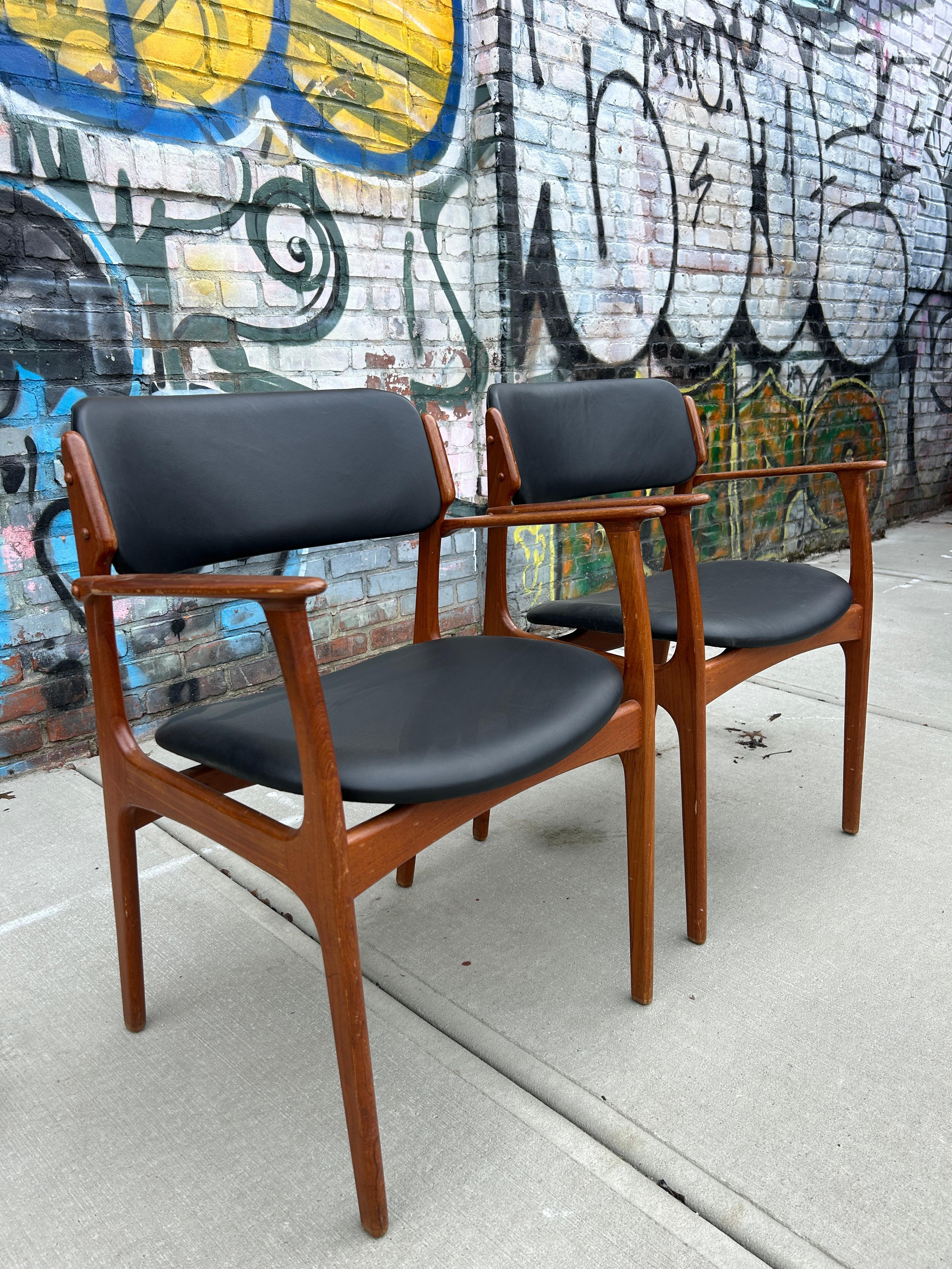 Danish Pair danish modern Teak model 49 leather dining arm chairs by Erik Buch For Sale