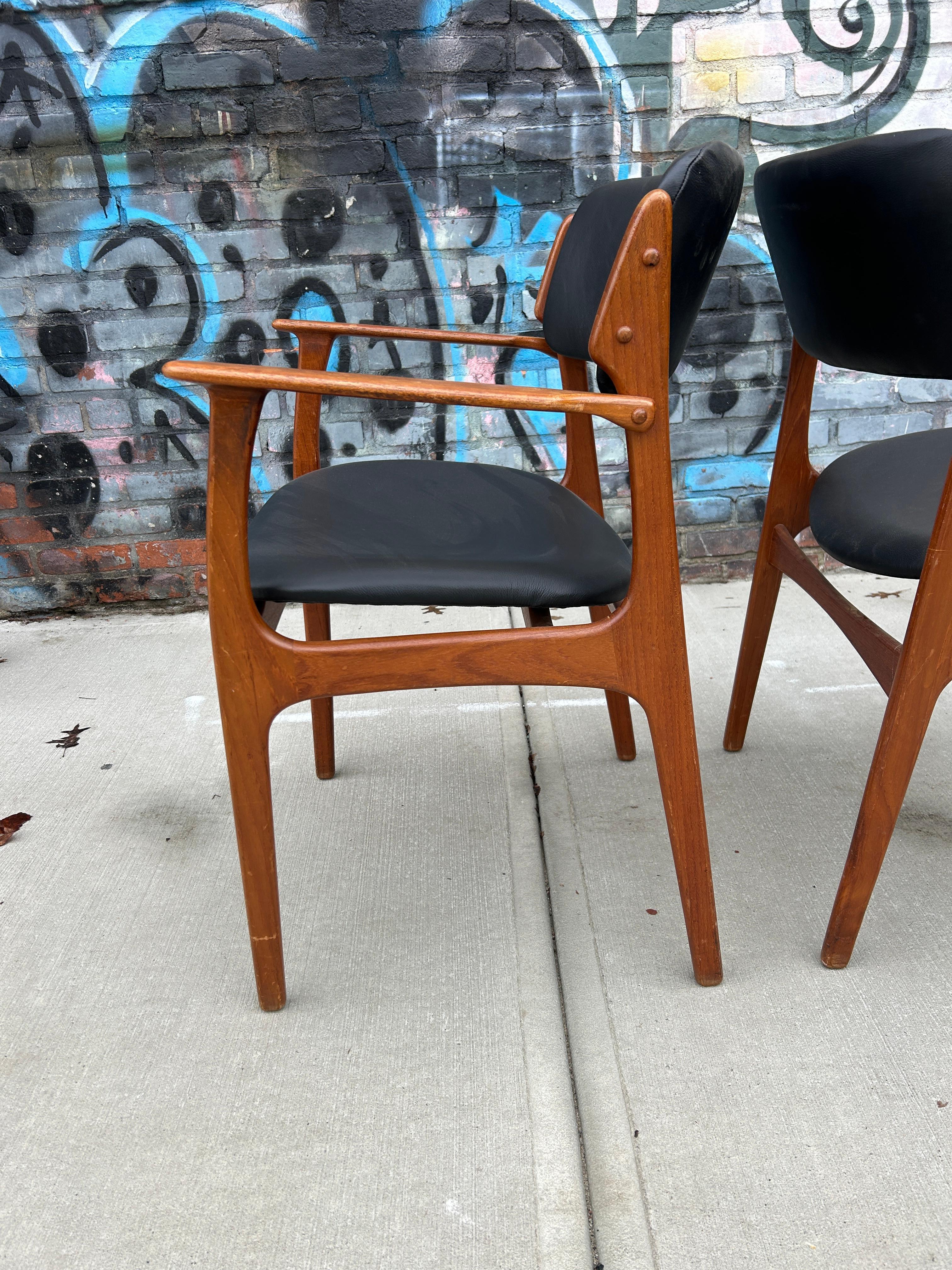 Pair danish modern Teak model 49 leather dining arm chairs by Erik Buch In Good Condition For Sale In BROOKLYN, NY