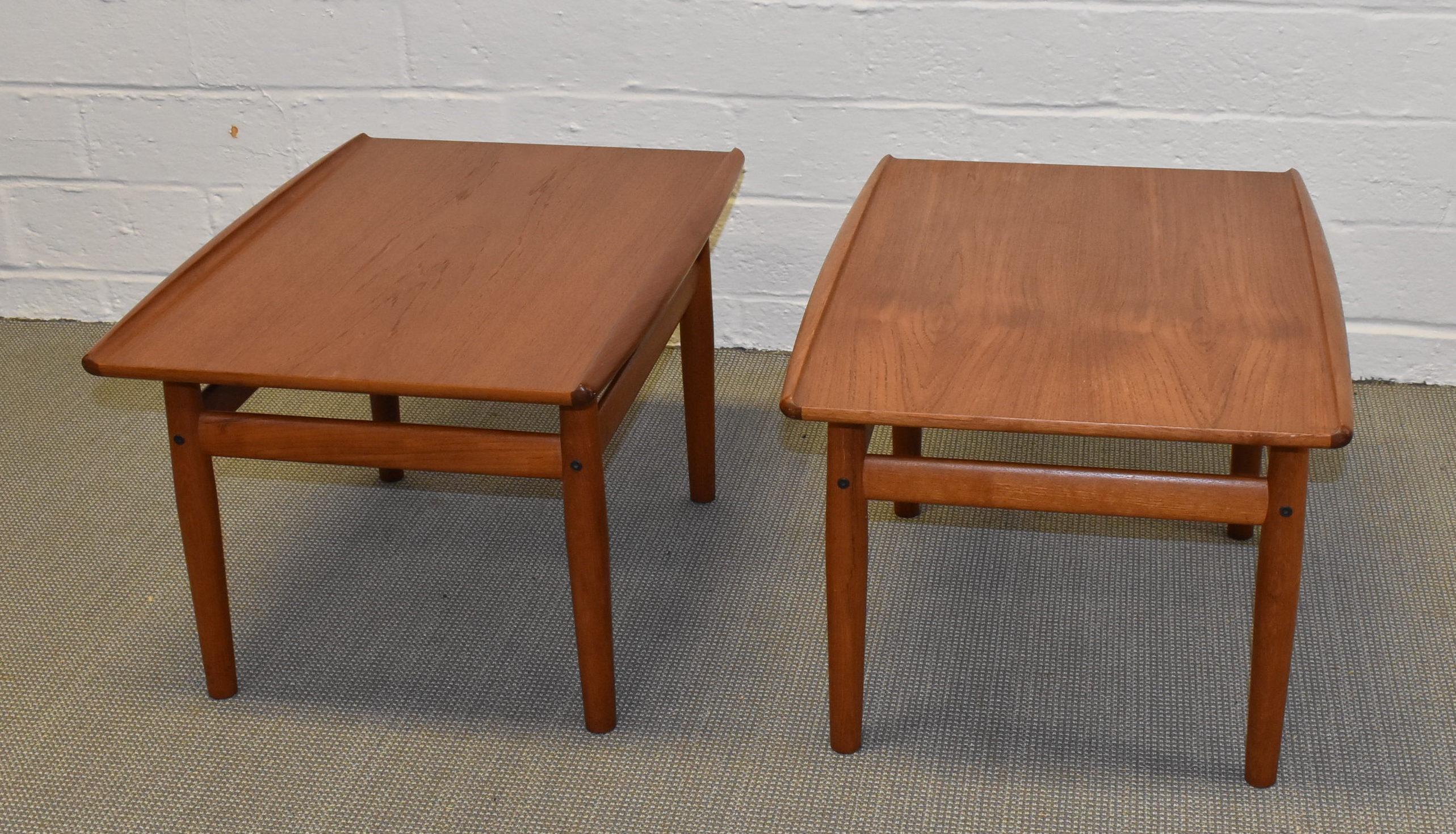 Pair of Mid-Century Modern teak side end tables. Very nice condition with original makers label. Designed by Grete Jalk for Glostrup Mobelfabrik. Dimensions of 20.5