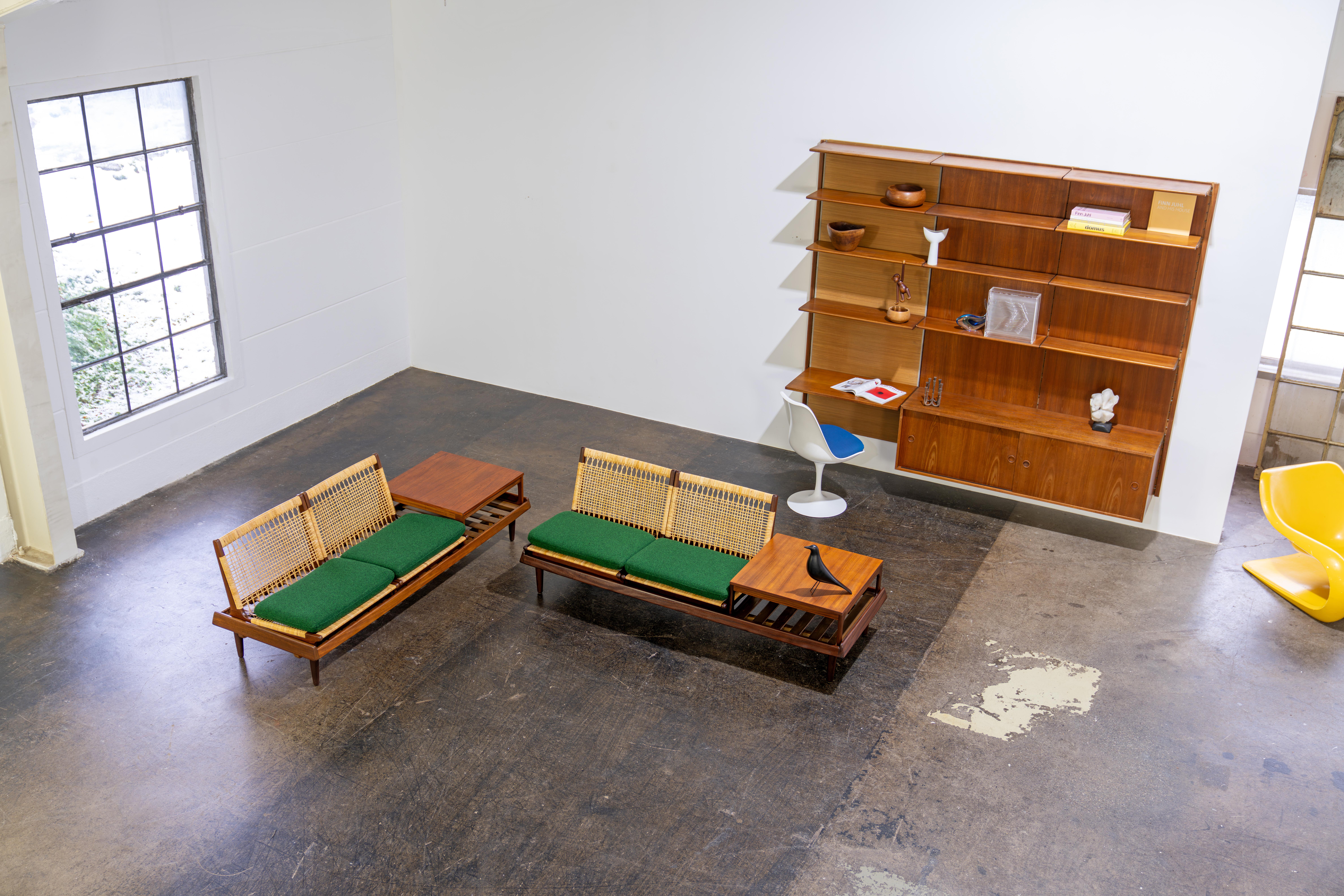 Pair of modular teak TV benches model 161 by Hans Olsen for Bramin, Denmark, ade in the 1960s. The set consists of two benches, four seating modules and two tables. Aside from beautifull rattan caning, the seats come with two cushions per seat, one