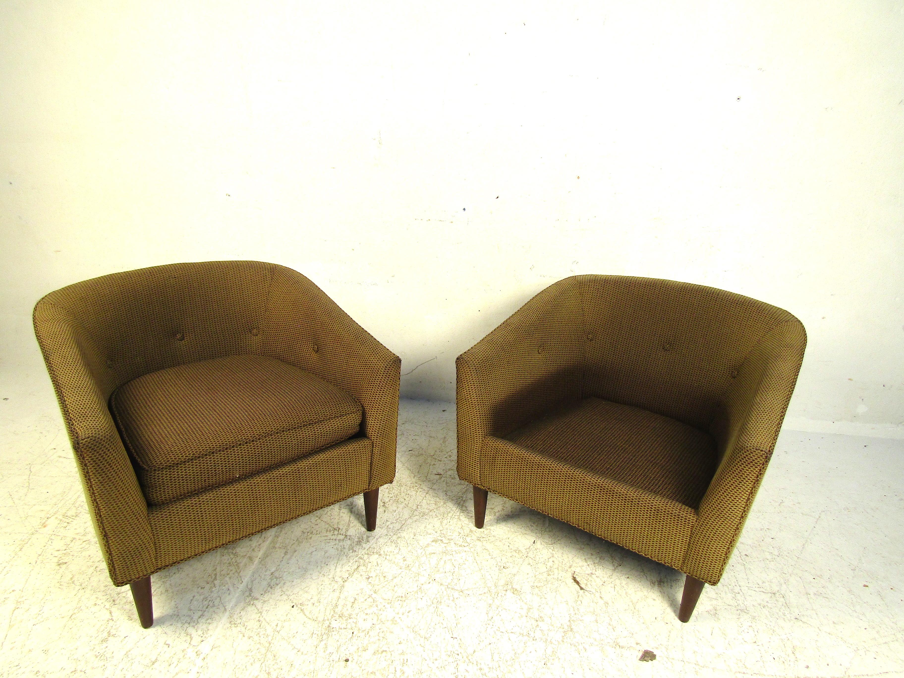 This pair of dark green lounge chairs feature a deep comfortable backset making them a perfect addition to any home office or library setup. Simple and clean design this set will add a flare of life to your space without being overbearing. Please