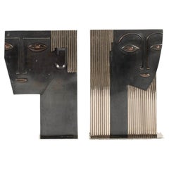Pair Deco Style Male Female Bronze Steel Vases in the manner of Franz Hagenauer