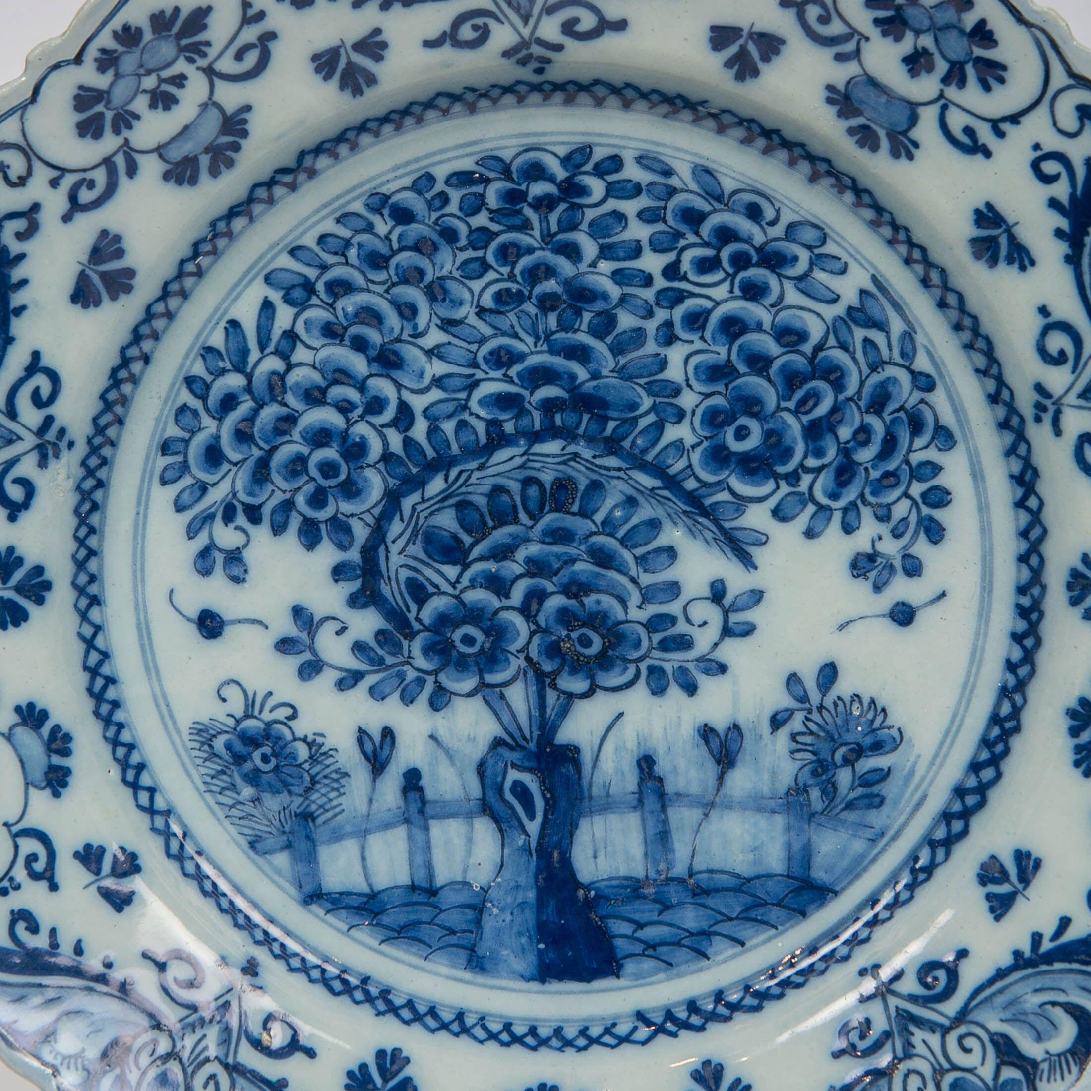 Hand-Painted Pair of Delft Blue and White Chargers in the Theeboom Pattern Made circa 1770