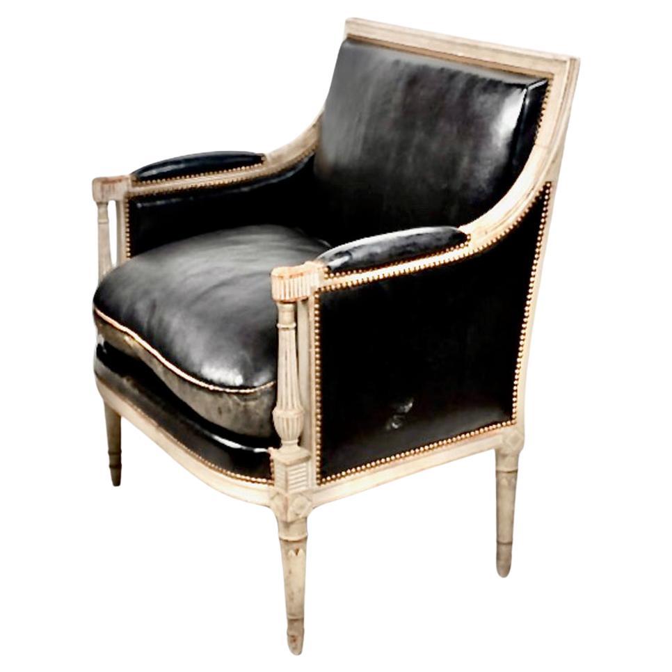 This is a superb pair of Directoire late 18th century or early 19th century Marquis or bergere a la reine. The quality and rarity of these chairs, in addition to their beauty, speak for themselves. The chairs have retained their original painted