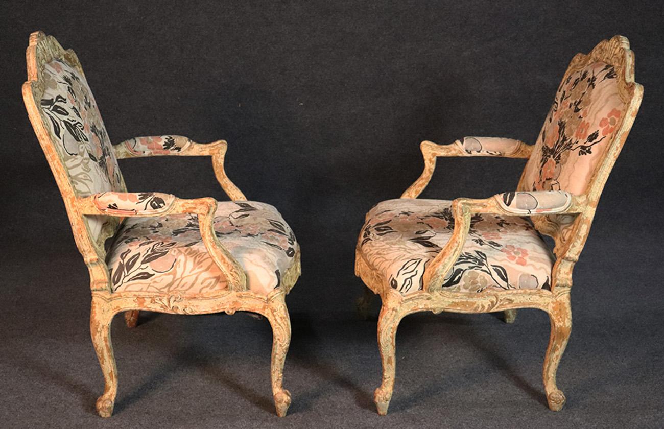 These gorgeous French style chairs have that antique chipping white paint to replicate a truly old chair, but these were made in the 1990s and are in excellent condition. The chairs are very comfortable and aside from their upholstery have gorgeous