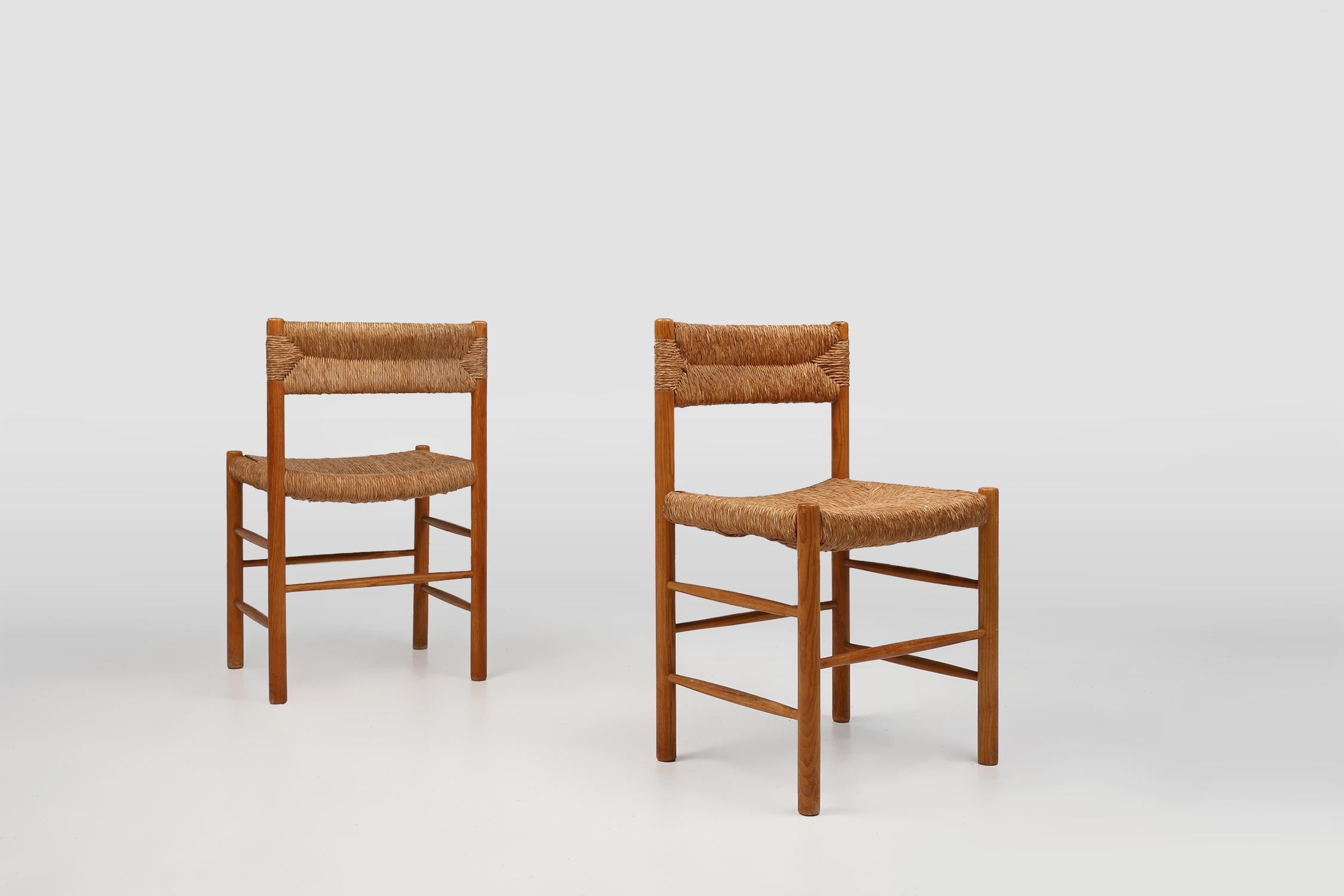 France / 1960 / set of 2 Dordogne chairs  / Charlotte Perriand and Robert Sentou / pine wood, straw / Mid-century / rustic 

This set of two Dordogne chairs were designed by Charlotte Perriand and executed by Robert Sentou in the 1960s in France.