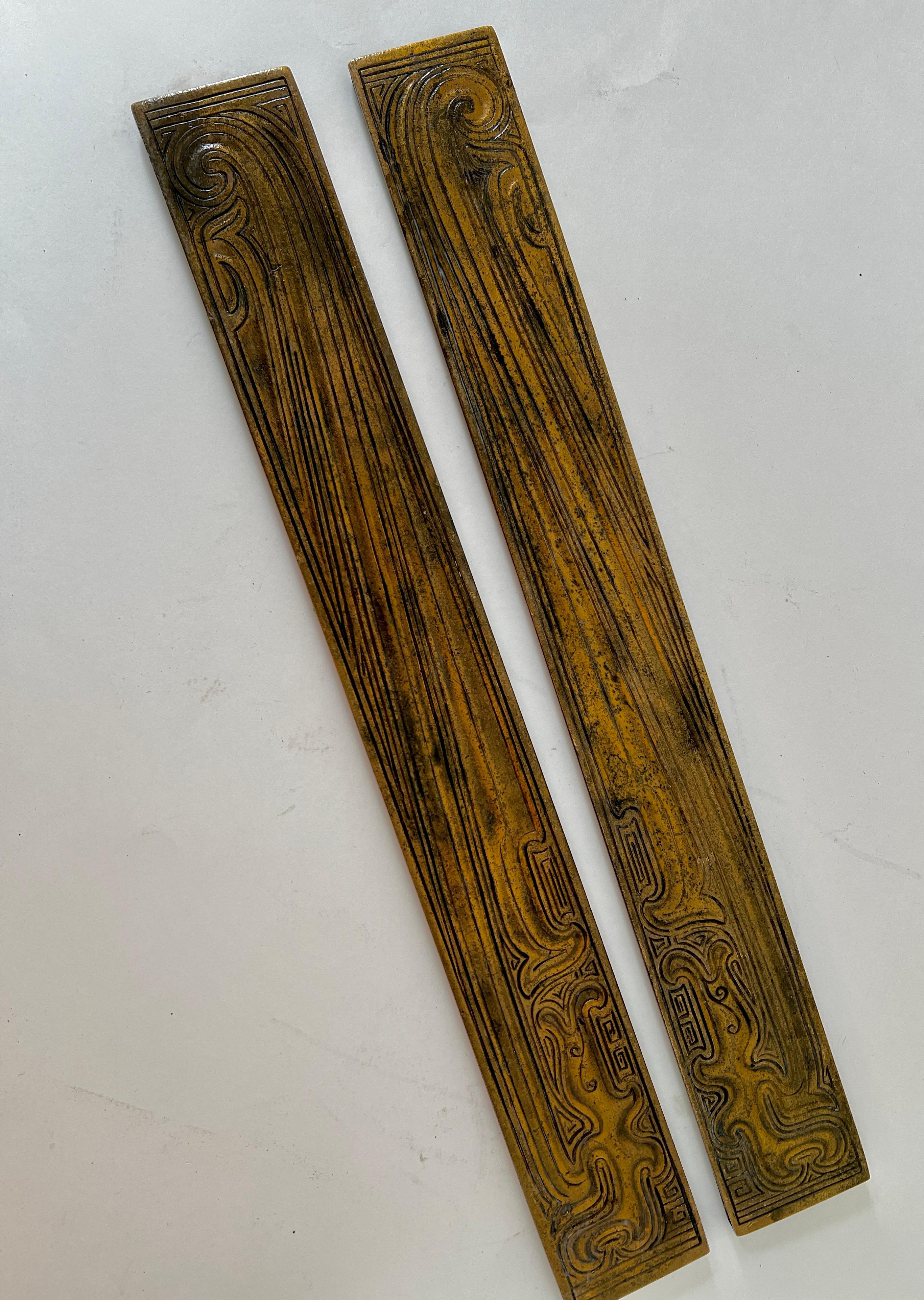 Pair of Dore or Gilt Bronze Blotter ends by Tiffany Studios New York.  The pair are item number 1751 and are a beautiful and rare Chinese pattern.  

Ready for any desk slits on the sides allow for easy set up with blotter.  The Chinese pattern is