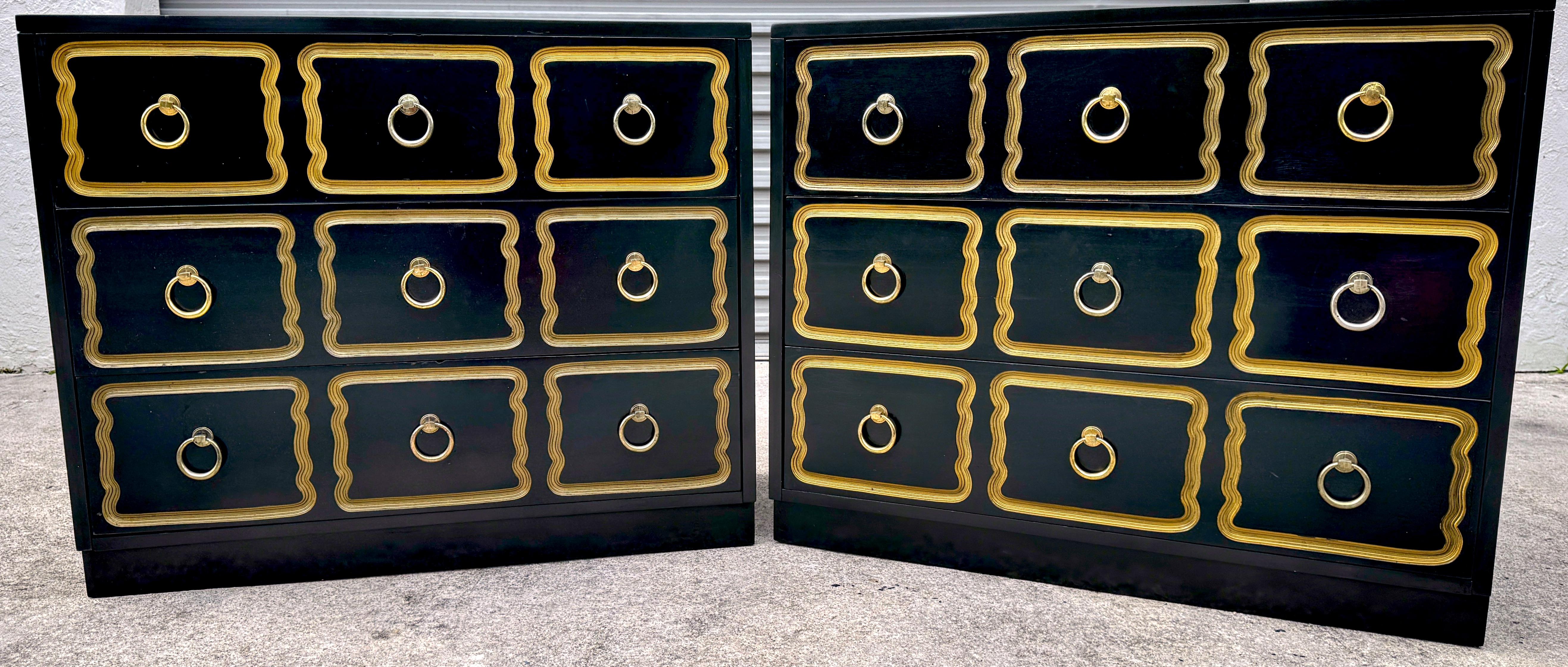 A Pair Dorothy Draper (1889–1969) Style 'Espana'  Black Lacquer & Gilt Chests/Nightstands 
USA, circa 1950s, 

An iconic pair of Dorothy Draper Espana dressers, embodying the Hollywood Regency style of one of the 20th century's pioneering female