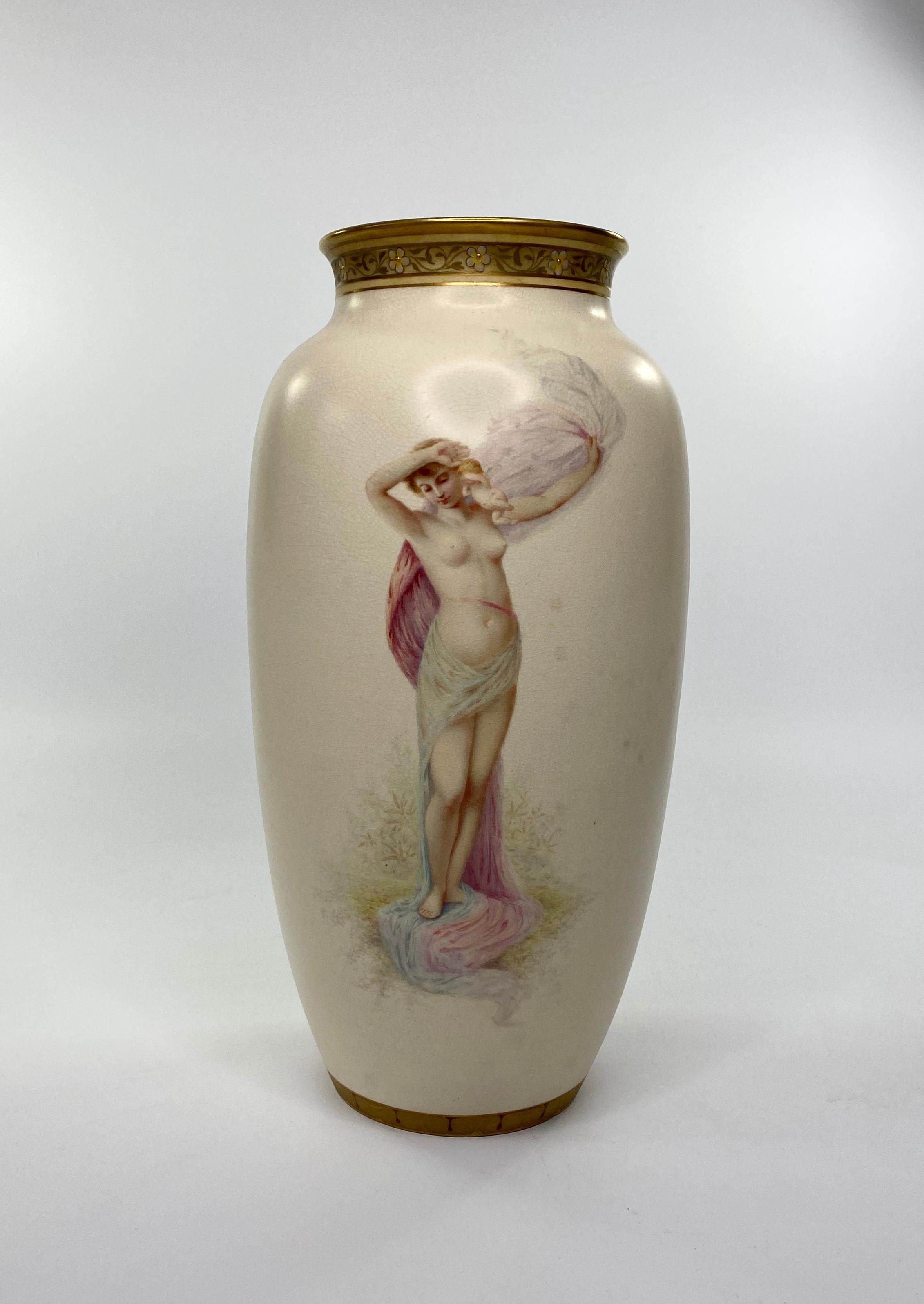 A fine pair of Doulton Lambeth faience vases, painted by John P. Hewitt, circa 1885. Both vases, beautifully hand painted with semi naked girls, posing in diaphanous drapes, whilst standing, bare foot on grass.
The rims, with continuous bands of