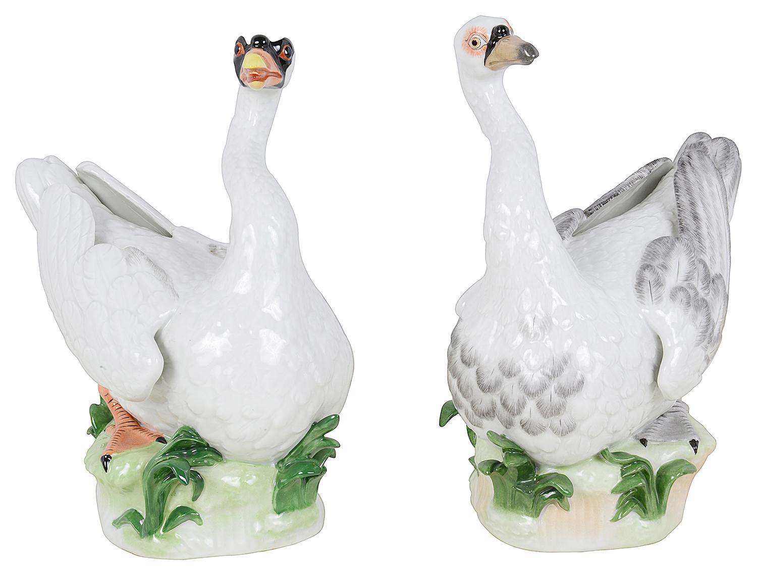 Pair Dresden porcelain hand painted Swans each with wonderful bold colouring, signed to the base in blue Dresden and stamped. Measure: 11