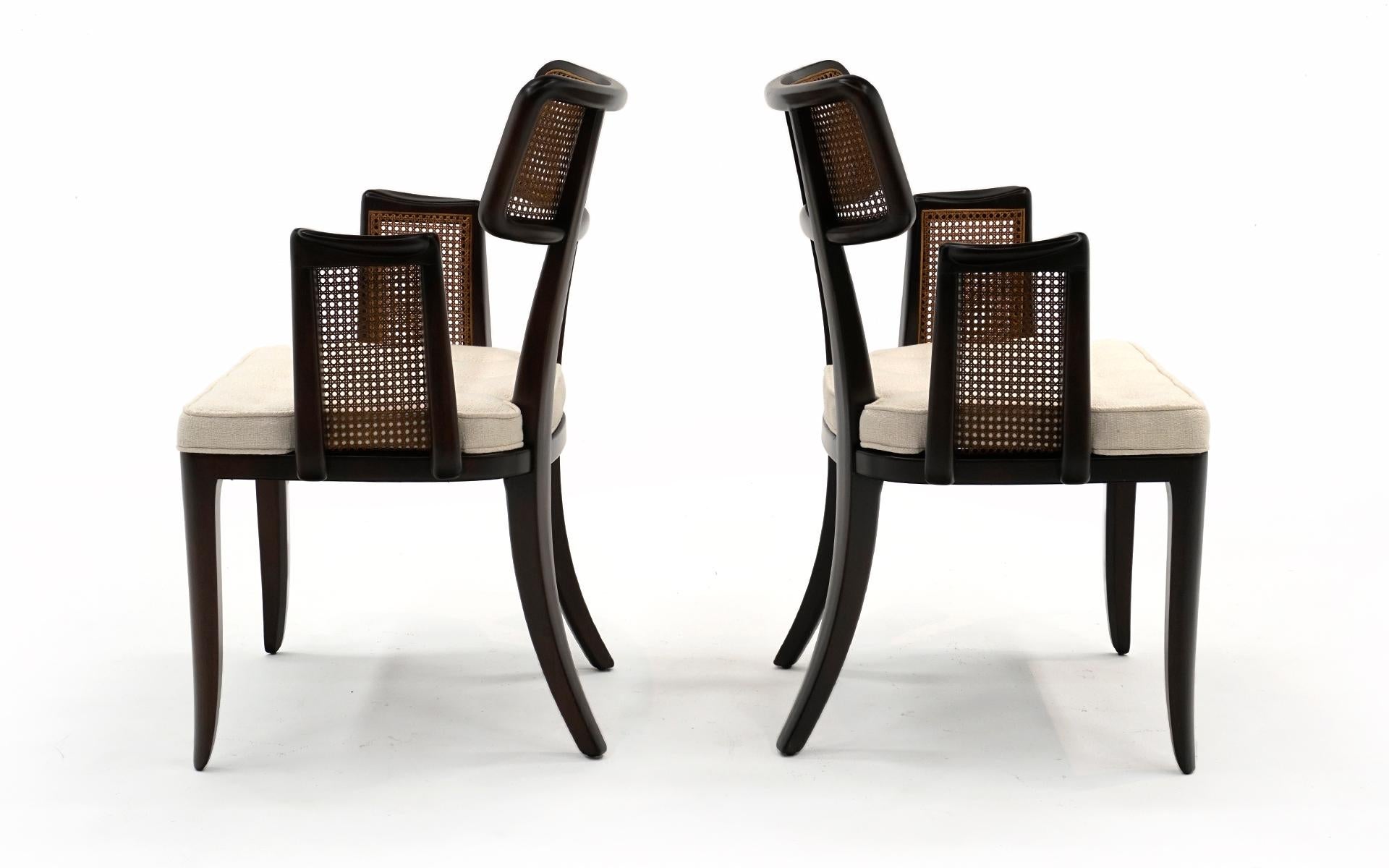 Pair Dunbar Dining Chairs with Arms. Dark Mahogany, Cane, Off White Boucle In Good Condition In Kansas City, MO
