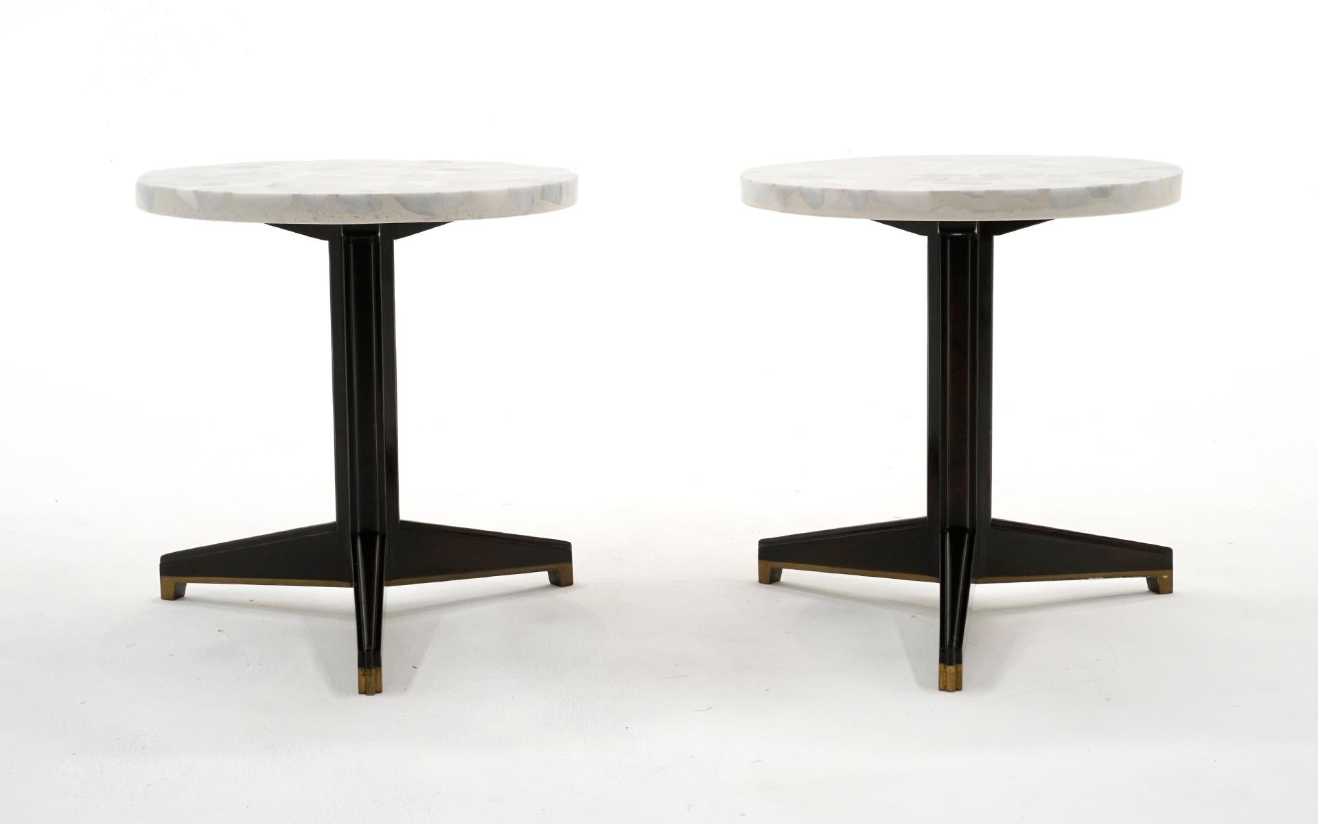 Very rare and desirable pair of Edward Wormley for Dunbar end tables. Round terrazzo tops with a solid Mahogany tripod base with solid brass support detail on the underside of the base structure. Both tops have been professionally polished and are