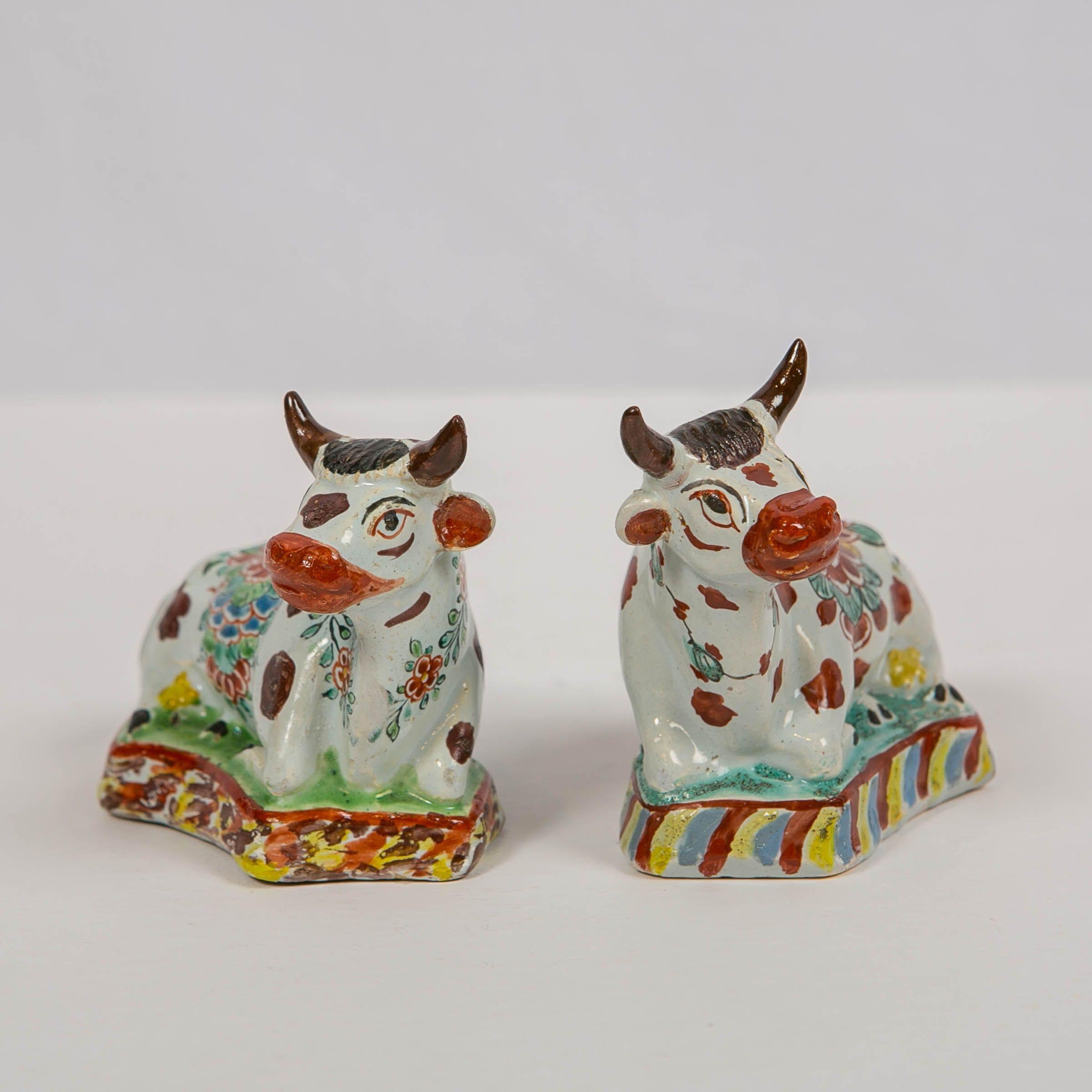 Rococo Pair of Dutch Delft Cows Painted in Polychrome Petit Feu Colors Made circa 1760