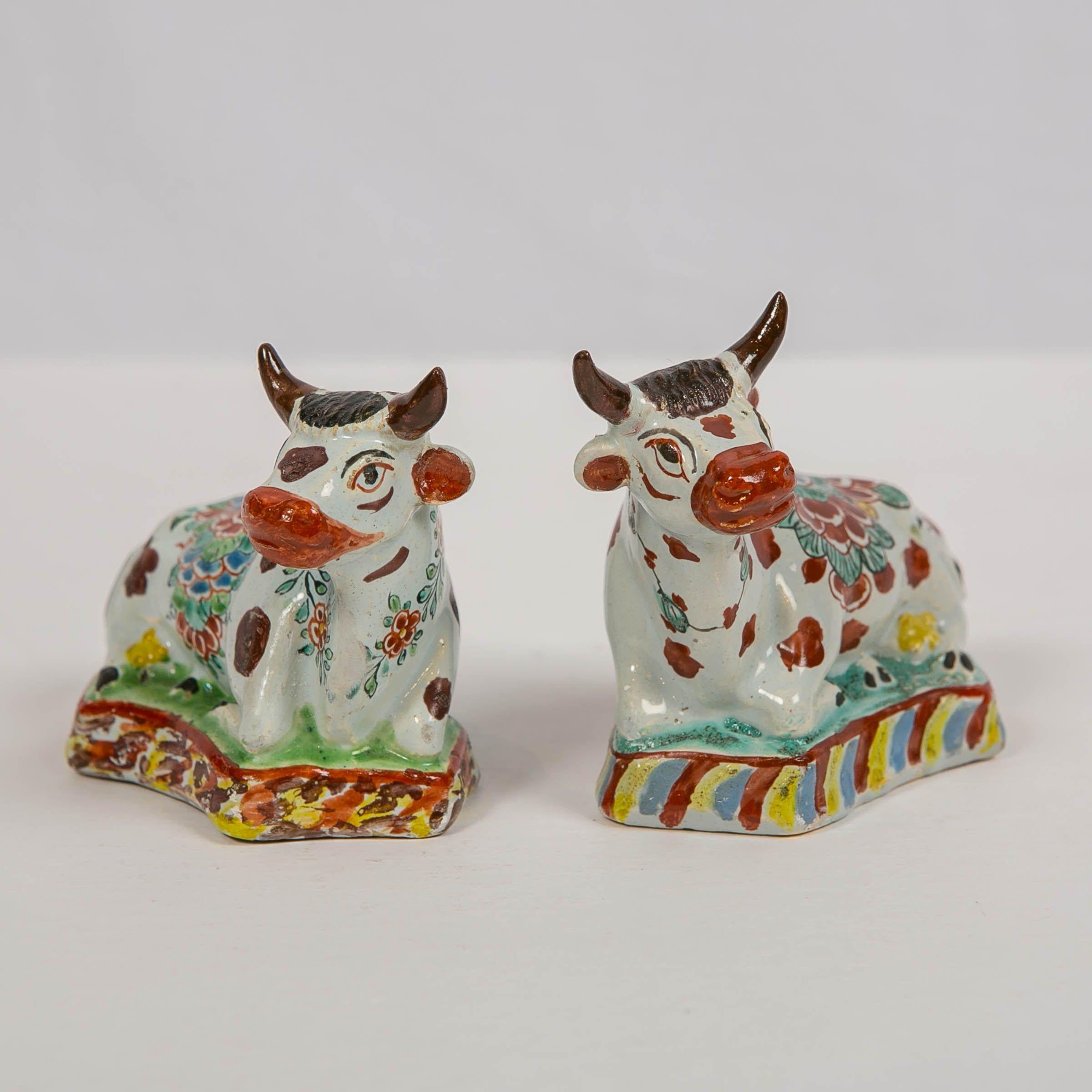 Hand-Painted Pair of Dutch Delft Cows Painted in Polychrome Petit Feu Colors Made circa 1760