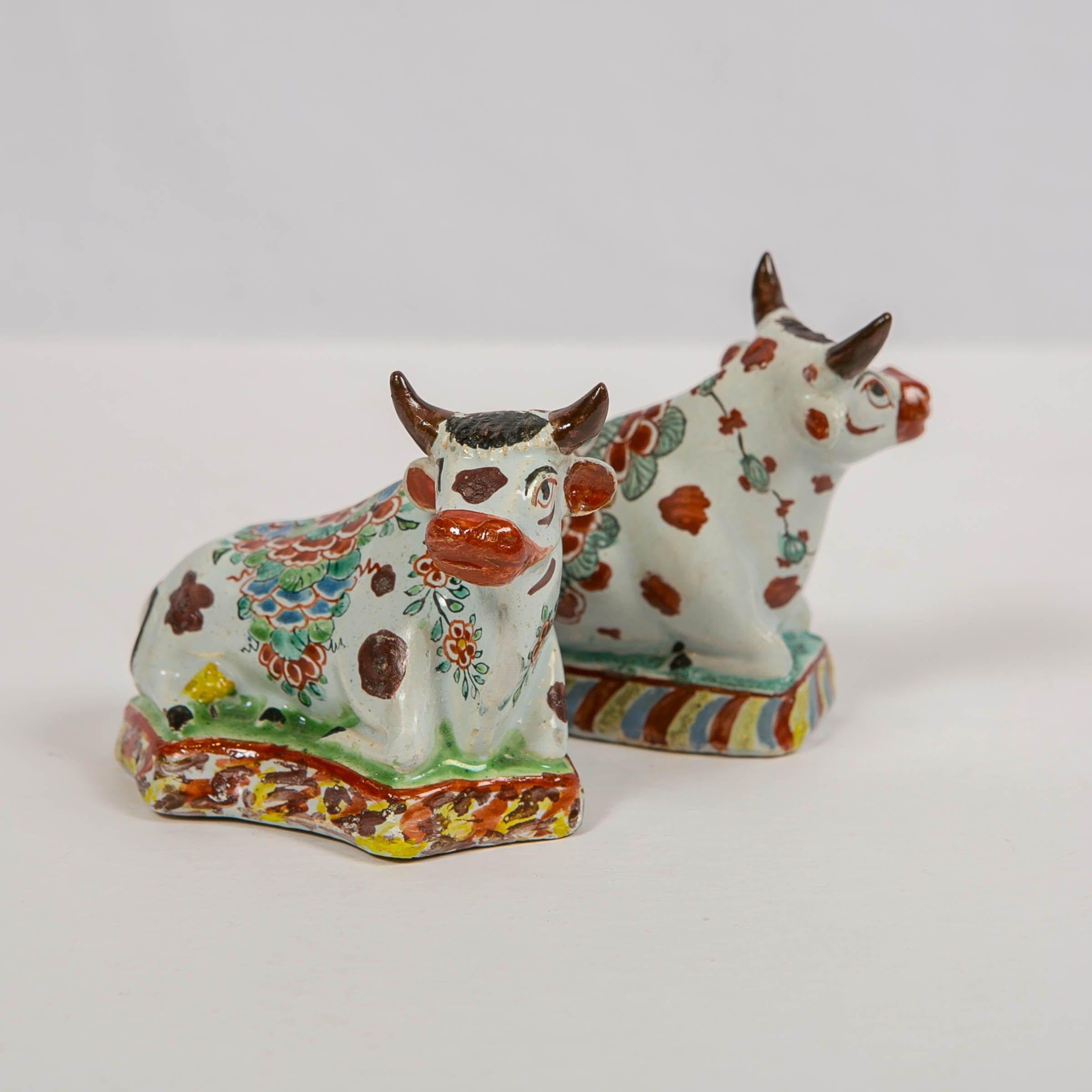 18th Century Pair of Dutch Delft Cows Painted in Polychrome Petit Feu Colors Made circa 1760