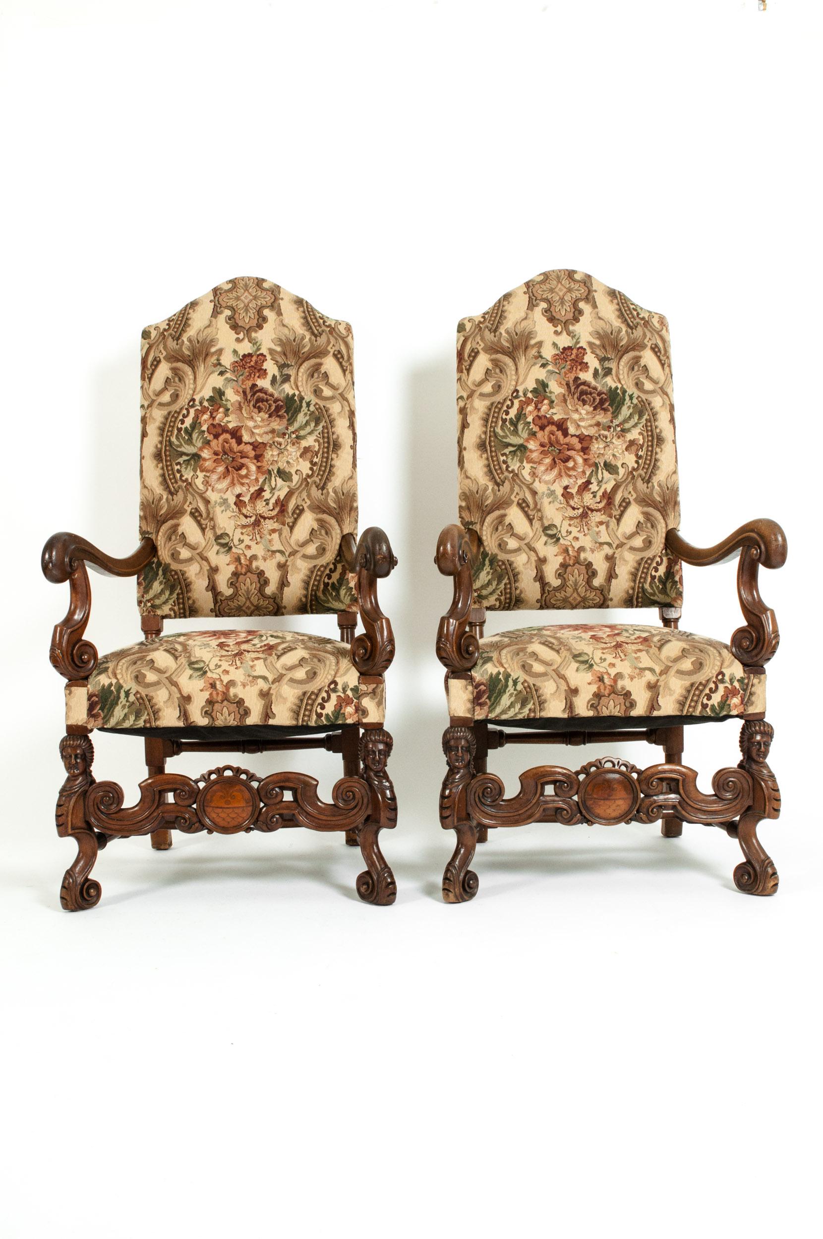 Pair Dutch hand carved walnut wood frame high back side / armchairs with figural Goddess heads / with tapestry upholstery. Each armchair is very sturdy & in excellent condition with appropriate wear consistent with age / use. Each armchair measure