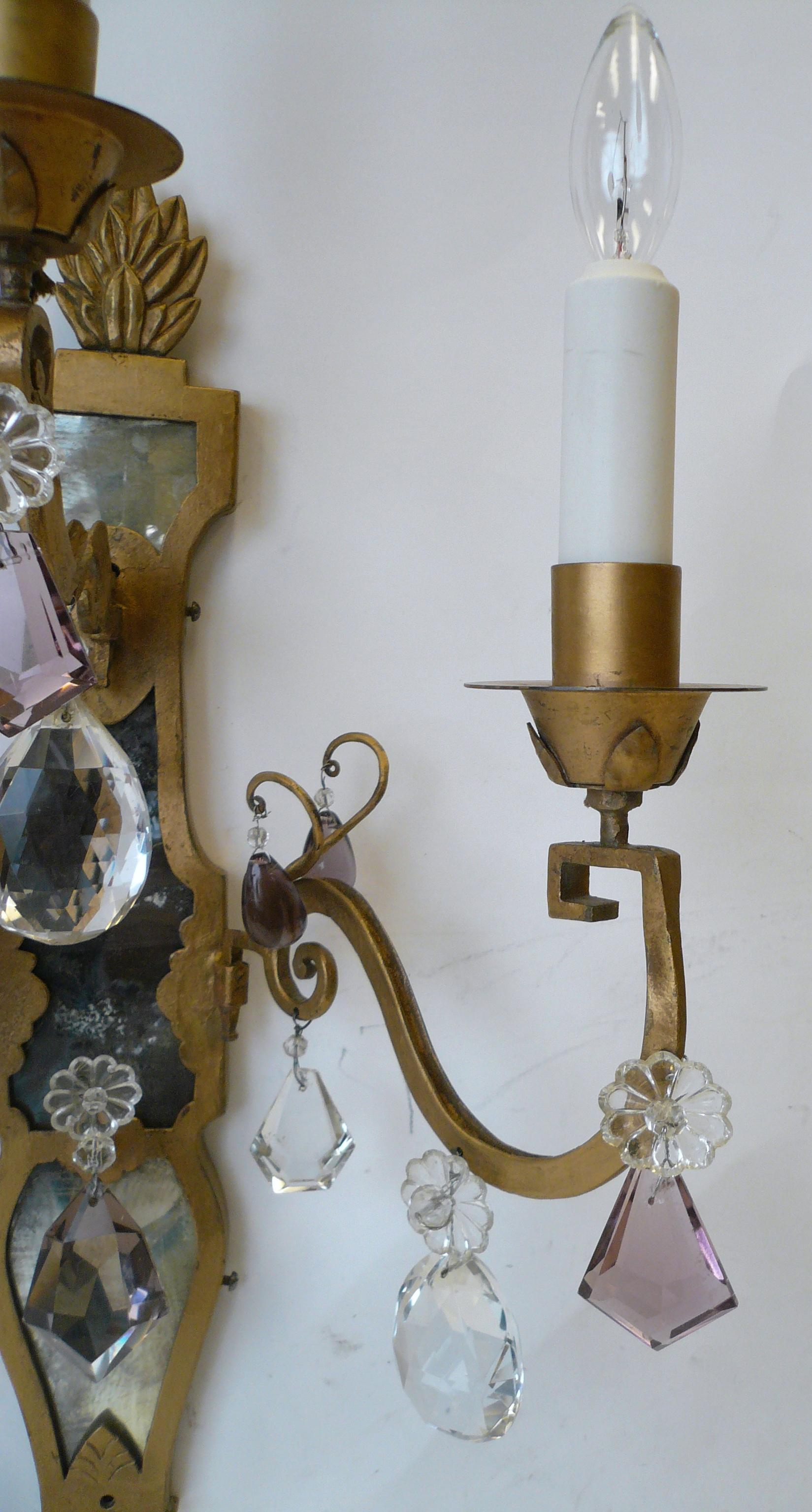 French Provincial Pair of E. F. Caldwell Gilt Wrought Iron, Mirror and Crystal Sconces For Sale