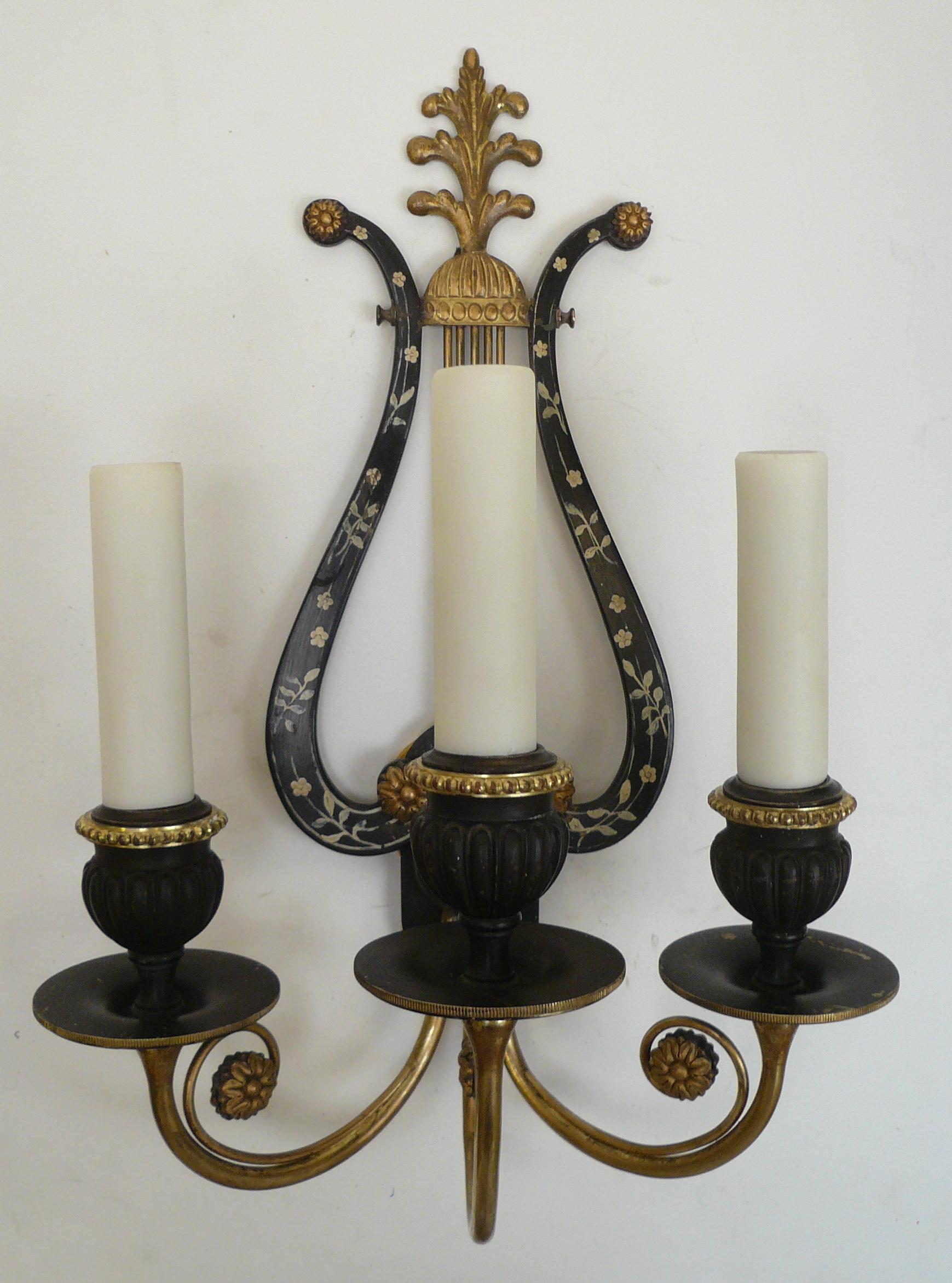 Patinated Pair of E. F. Caldwell Lyre Form Bronze Sconces For Sale