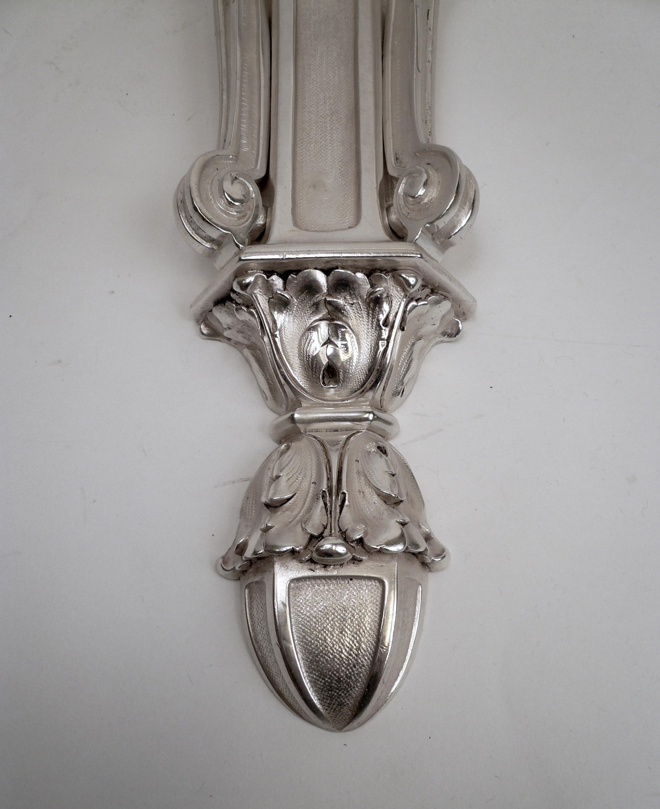 American Pair of E. F. Caldwell Silvered Bronze Two-Light Georgian Style Sconces For Sale