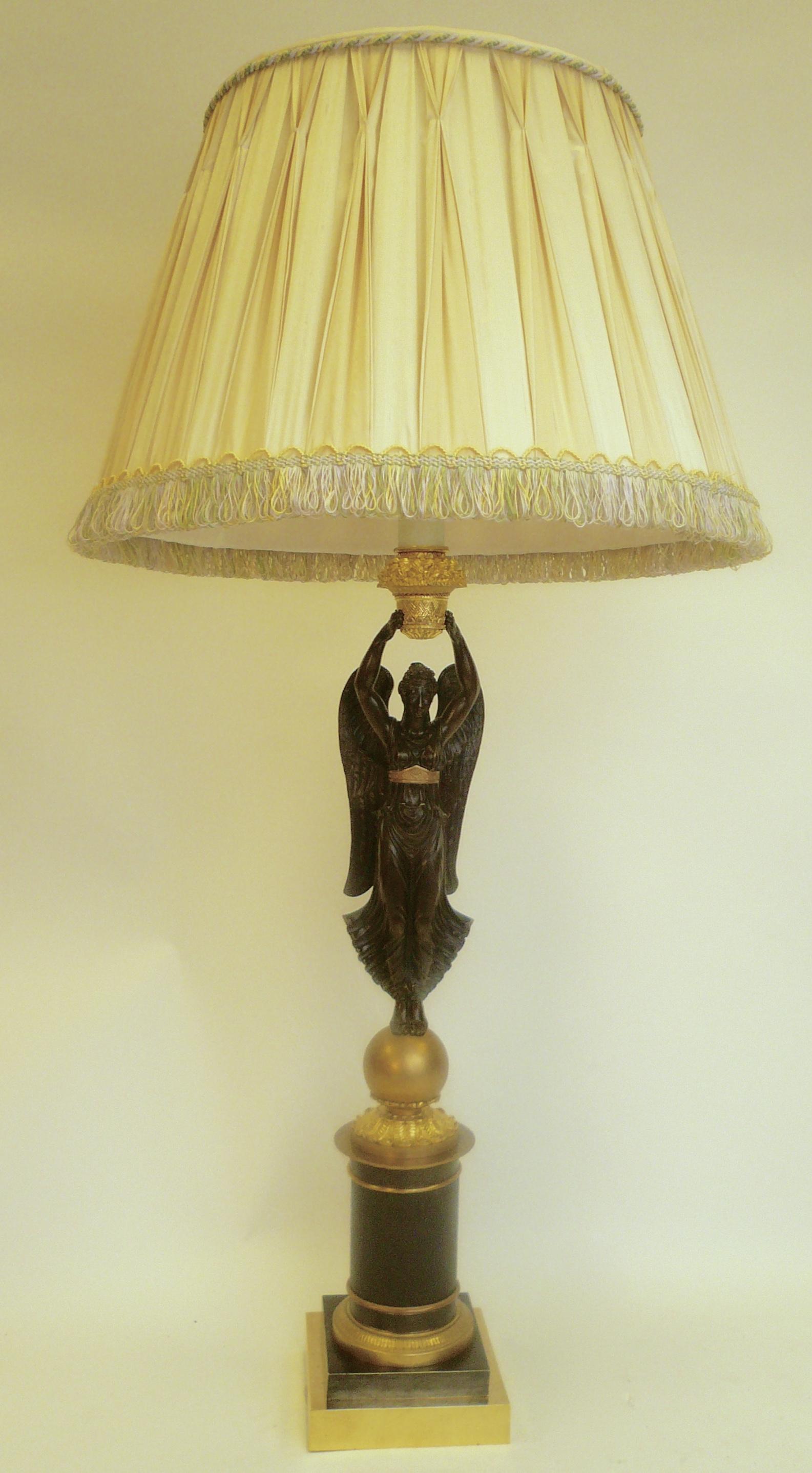 Gilt Pair of Early 19th Century French Empire Figural Bronze Lamps