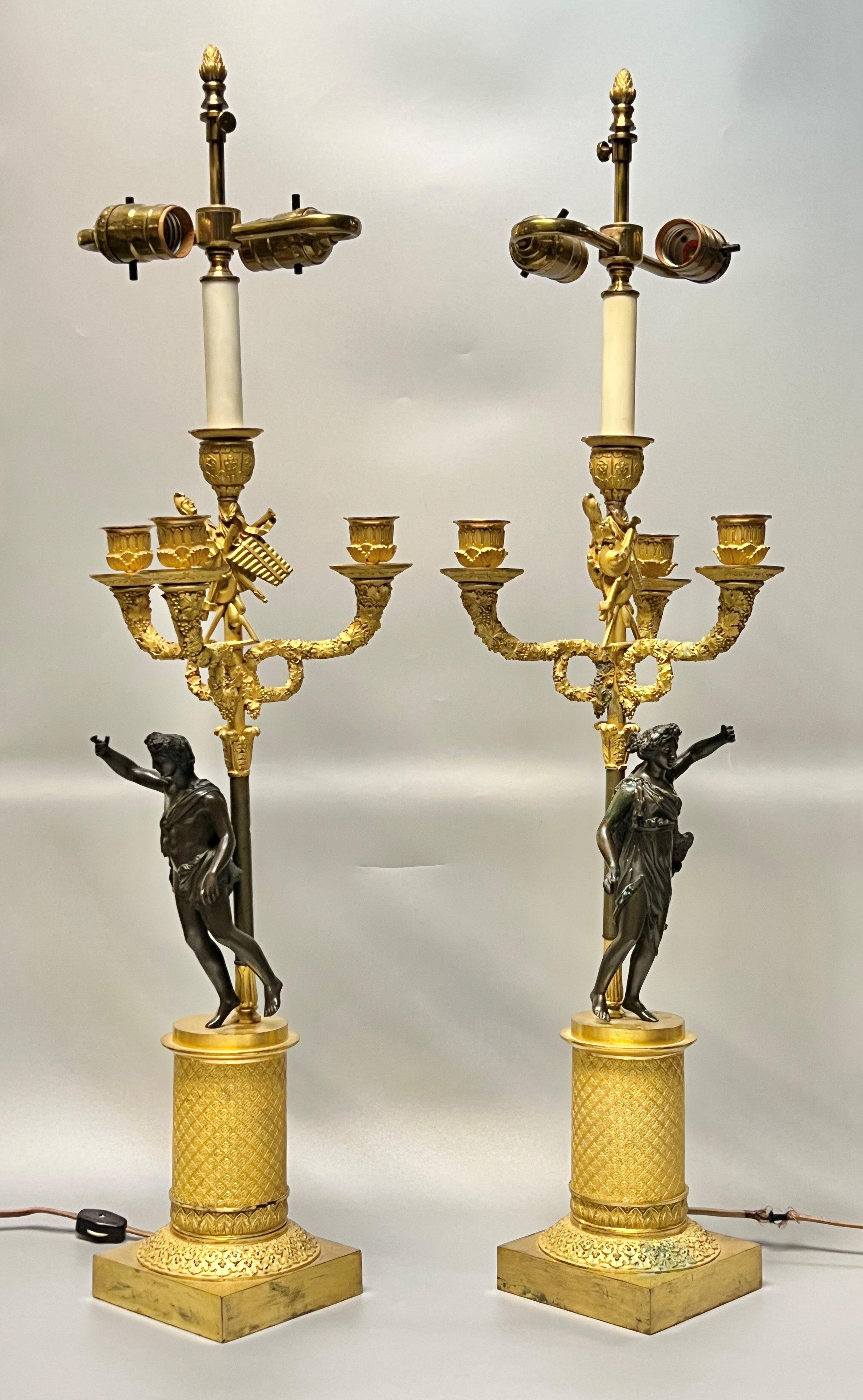 Gilt Pair early 19th Century French Empire Figurative Ormolu Bronze Candelabra Lamps For Sale