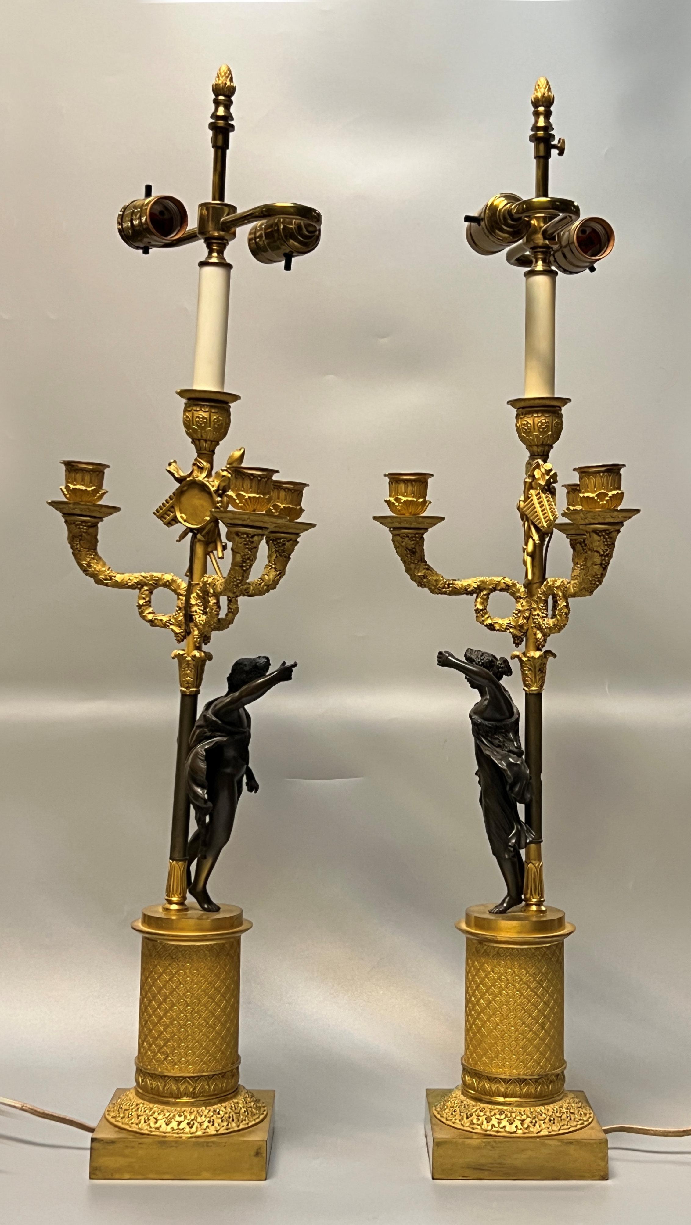 Pair early 19th Century French Empire Figurative Ormolu Bronze Candelabra Lamps In Good Condition For Sale In New York, NY