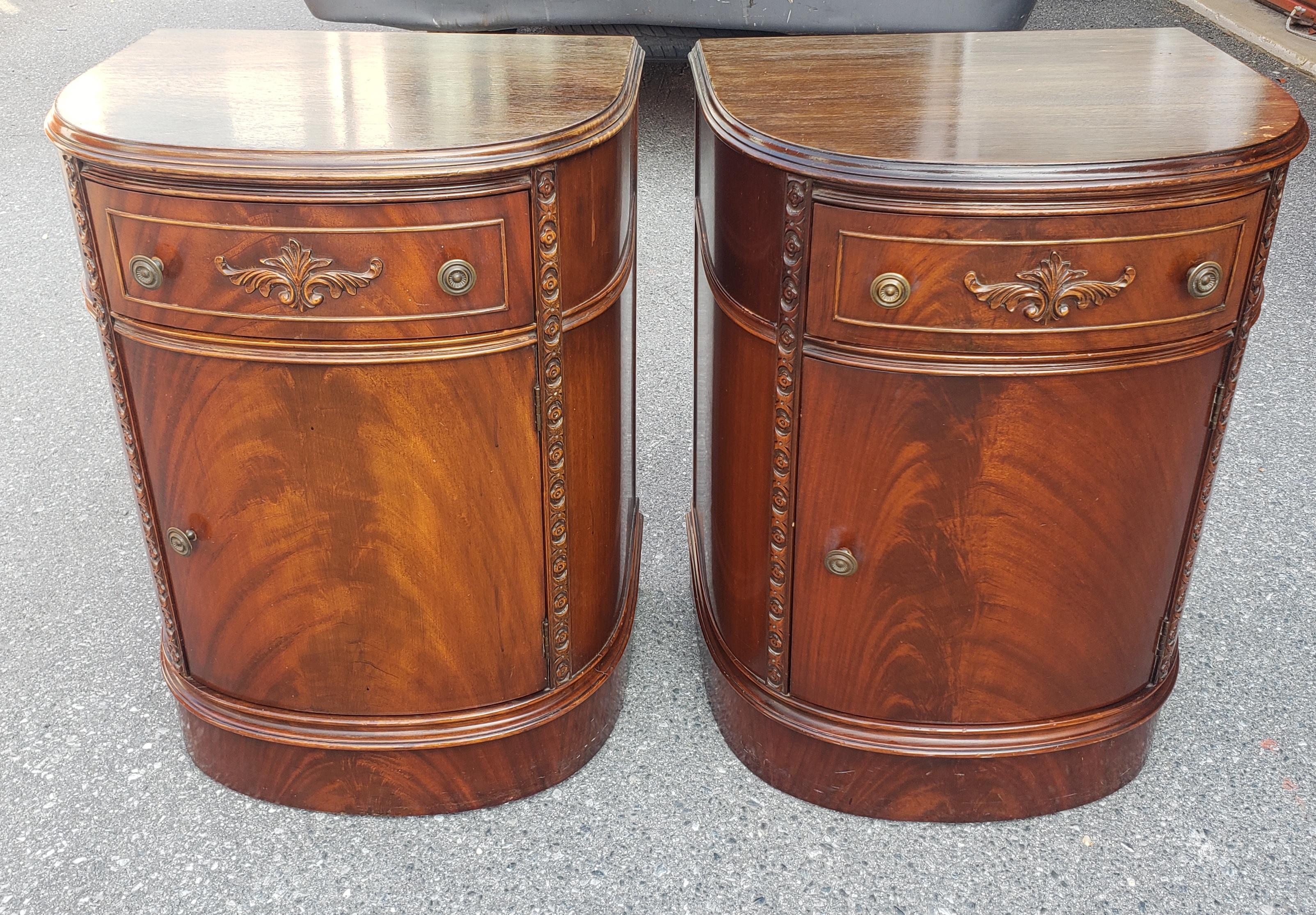 A gorgeous, rare Pair of  Early 20th Century American Empire Bow Front Flame Mahogany Bedside Cabinet Tables with Beatiful craving decorations.
Measure 23 in width, 18