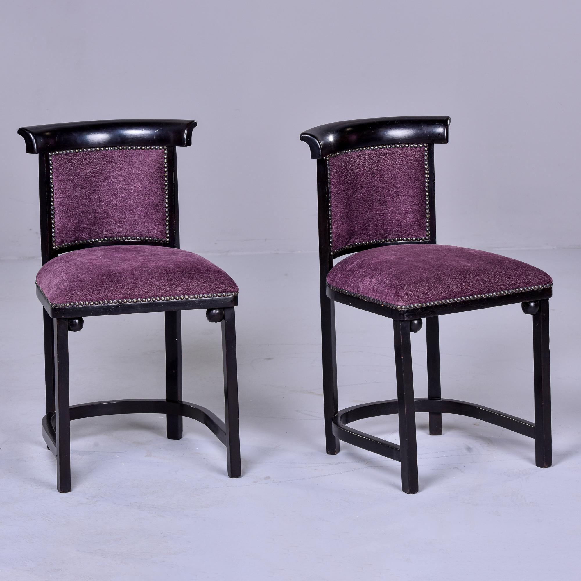 Circa 1910 pair of Art Nouveau Fledermaus side chairs designed by Josef Hoffmann for Austrian manufacturer Jacob & Josef Kohn. This firm, known as J & J Kohn worked produced Josef Hoffmann furniture designs before merging with Mundus in 1914 and