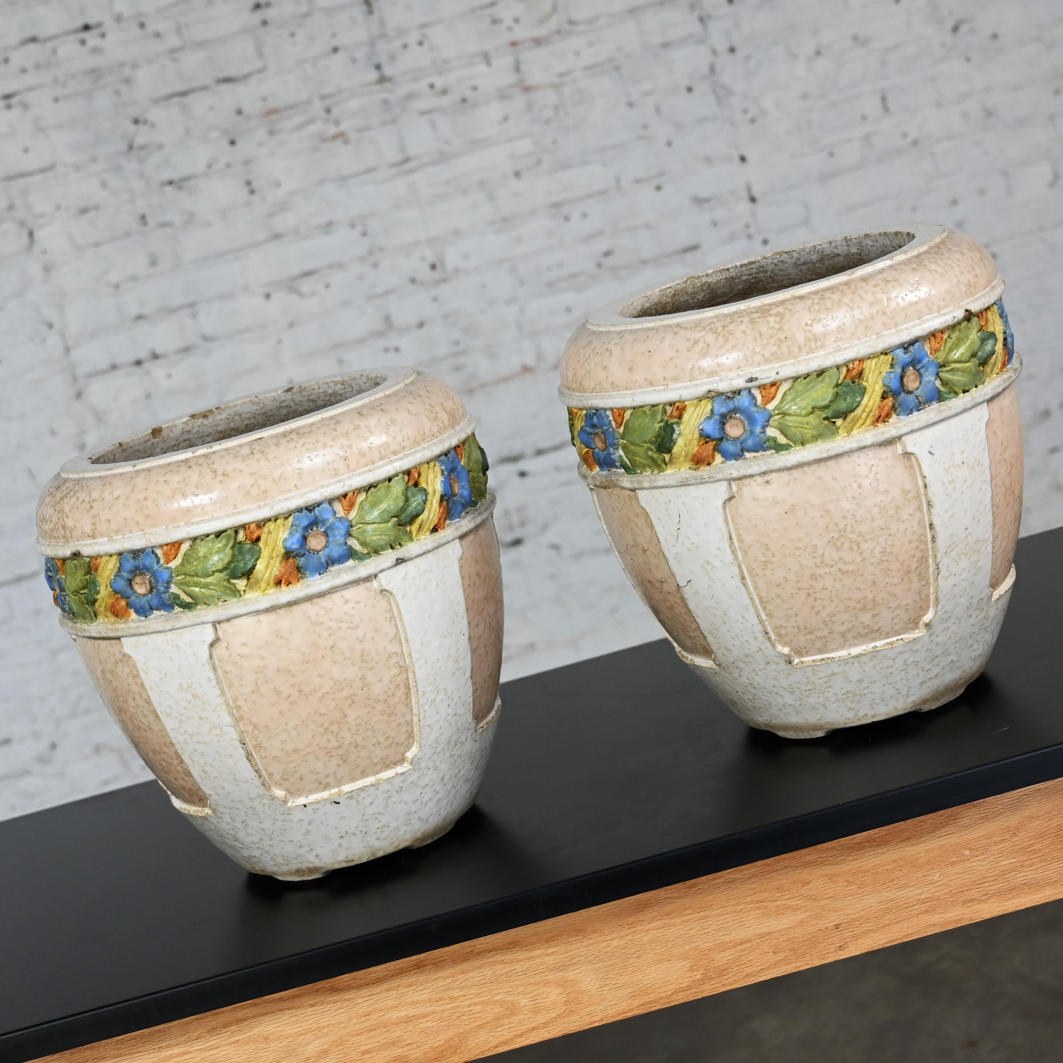 Lovely antique Architectural glazed terracotta planters with floral details, a pair. These pots are most likely made by one of the terracotta tile makers who supplied the gorgeous decorative tiles used on so many of the beautiful buildings of the