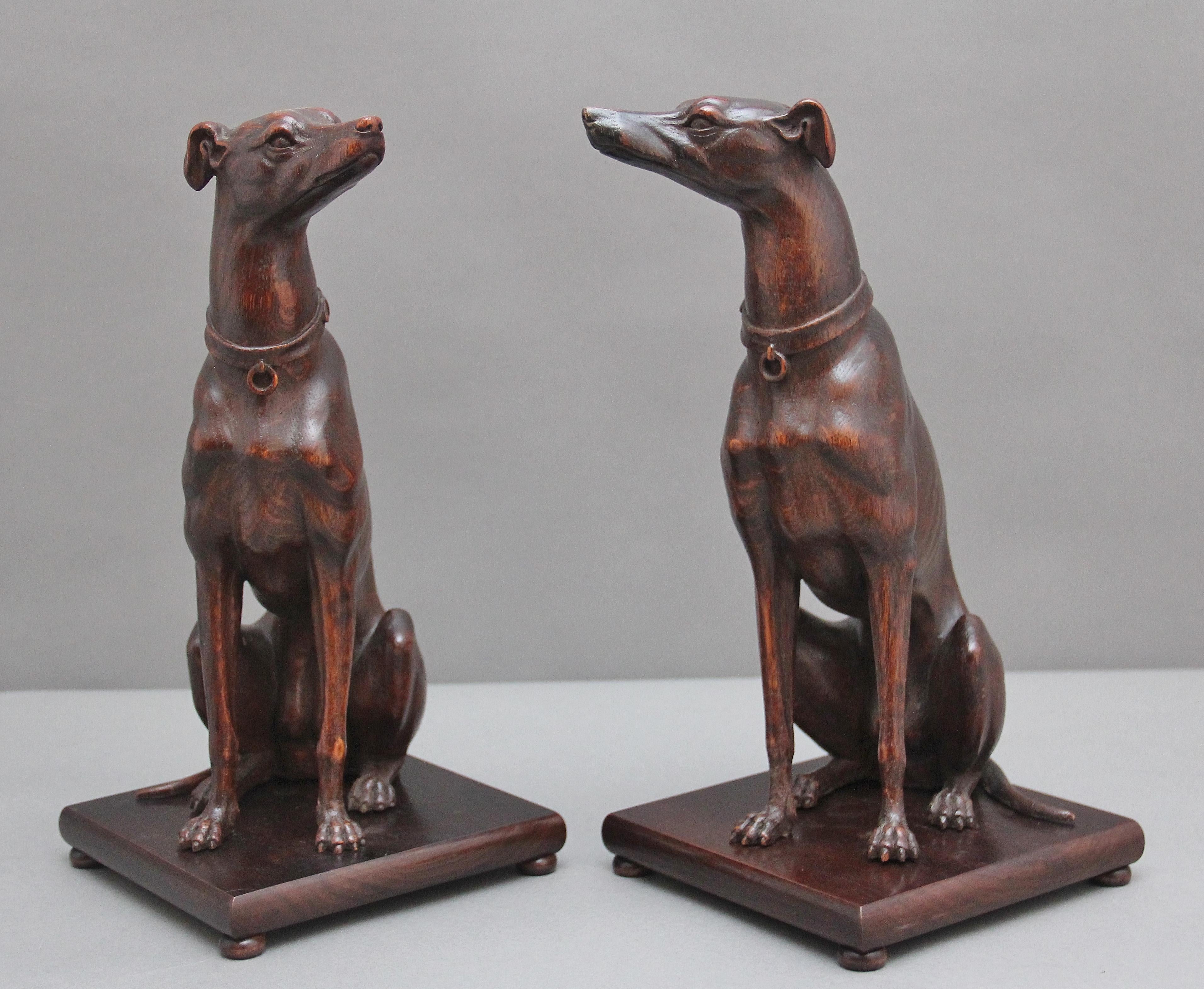 British Pair early 20th Century carved oak greyhounds