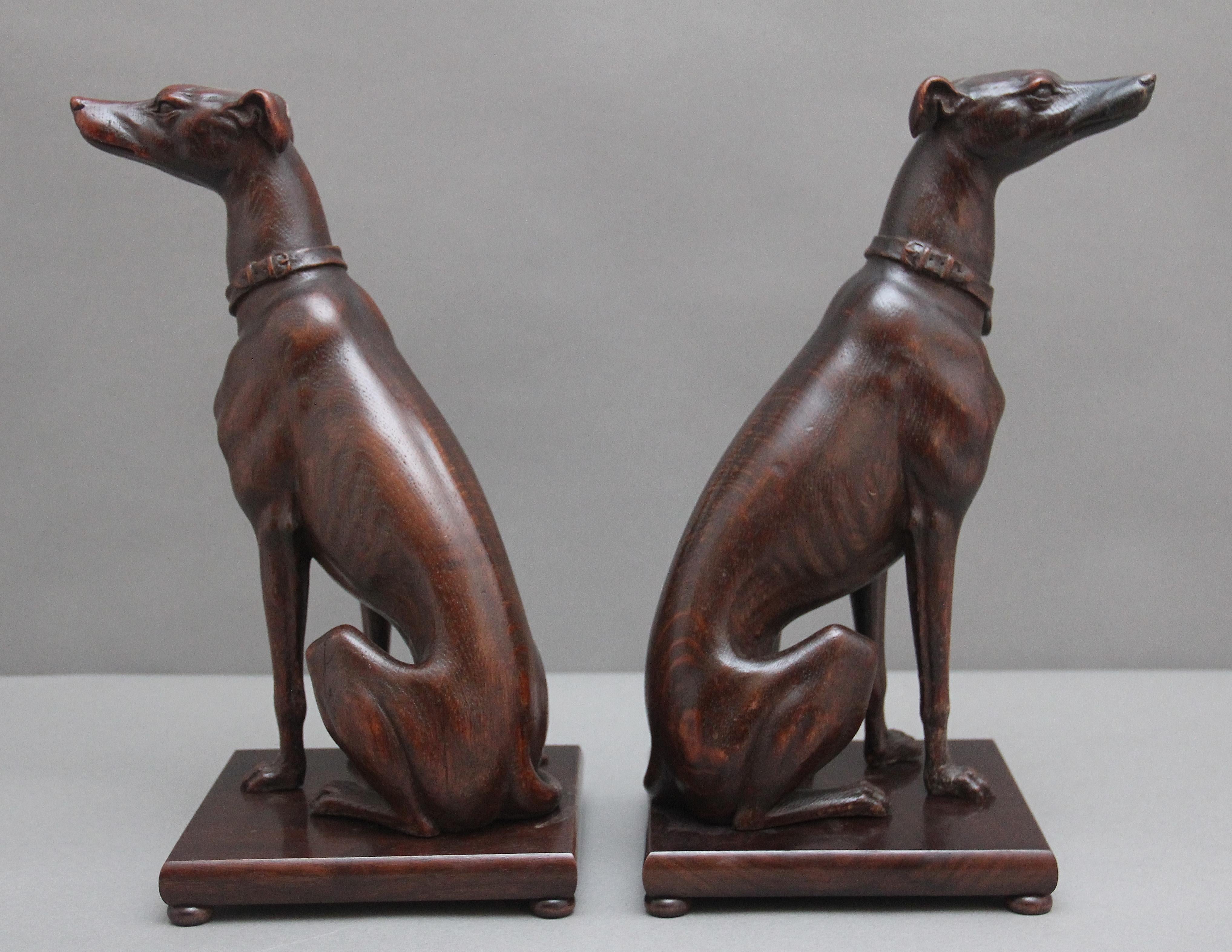 Pair early 20th Century carved oak greyhounds 1