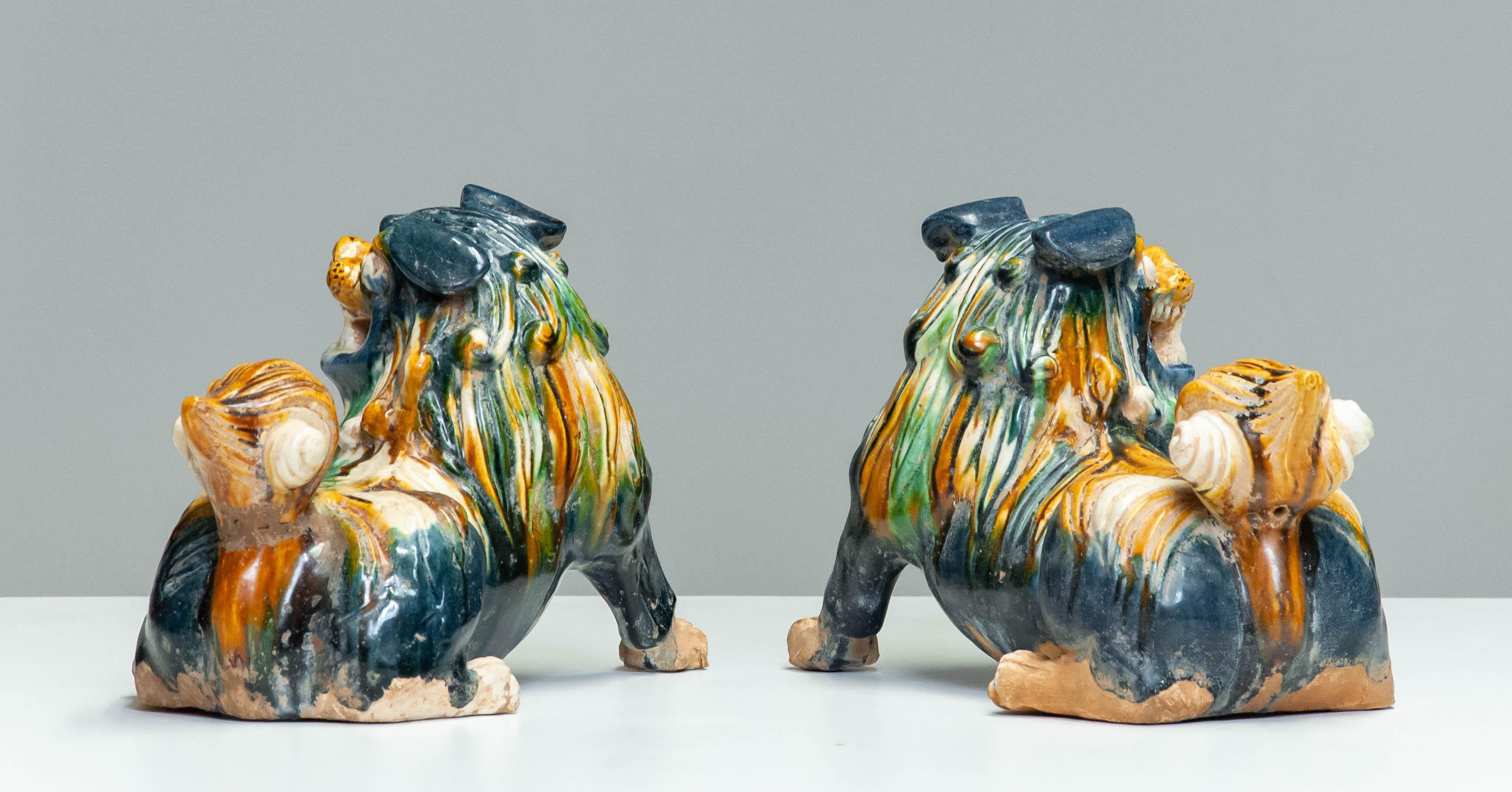 Pair Early 20th Century Chinese Ceramic Foo Dogs For Sale 1